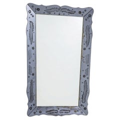 Pietro Chiesa elegant mirror with shaped frame in cut and engraved gl