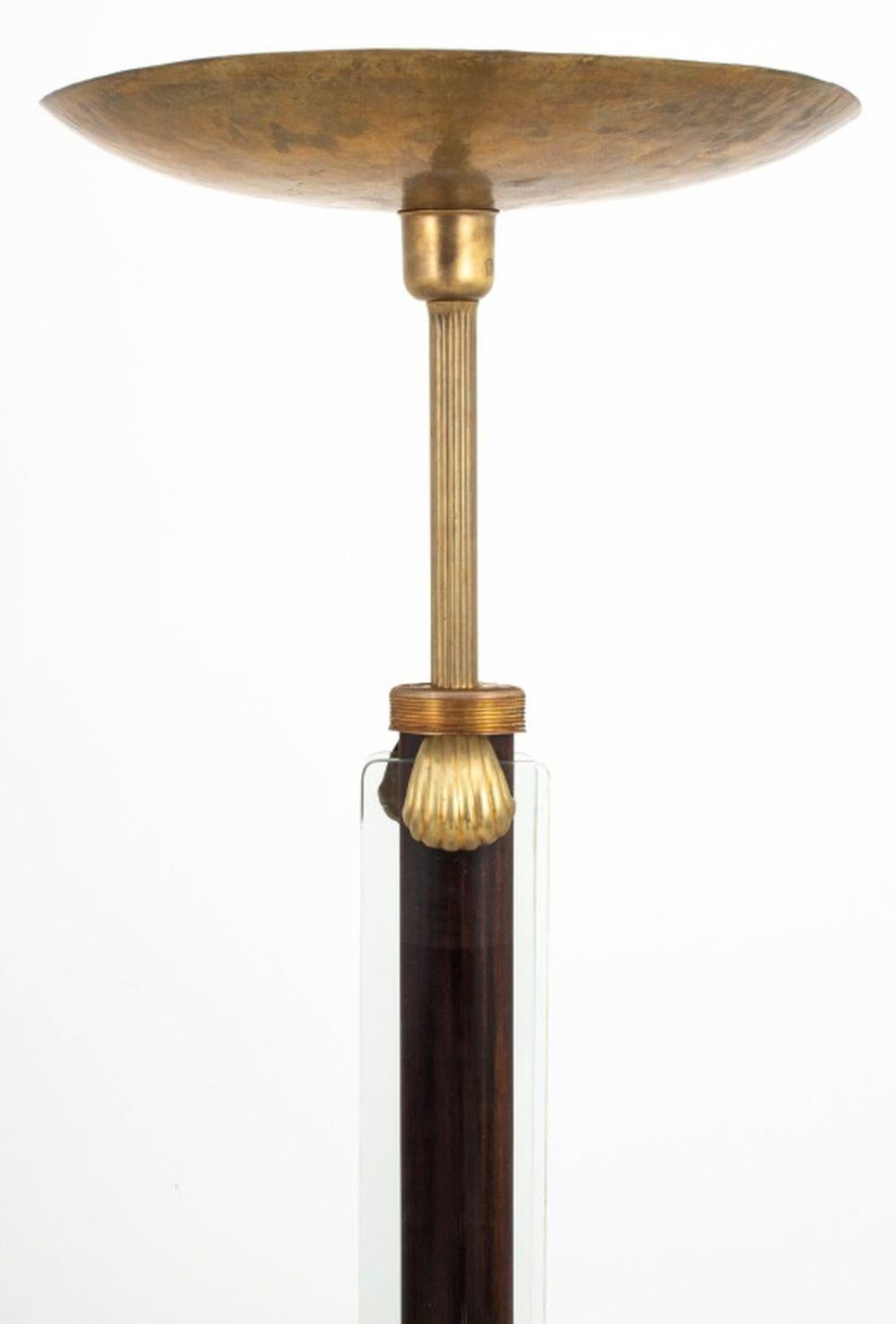Pietro Chiesa for Fontana Arte Attributed Floor Lamp, circa 1930, glass panels over ebonized wood column, fastened with brass shell clips, with brass disc lampshade.

69