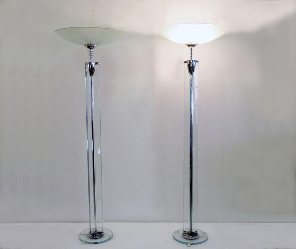 Fontana Arte design Pietro Chiesa, a very rare pair of crystal floor lamps, 1930s.
Thick beveled crystal base and structure with chromed brass details. The stem is made of three thick beveled crystals terminating in a chromed brass structure which