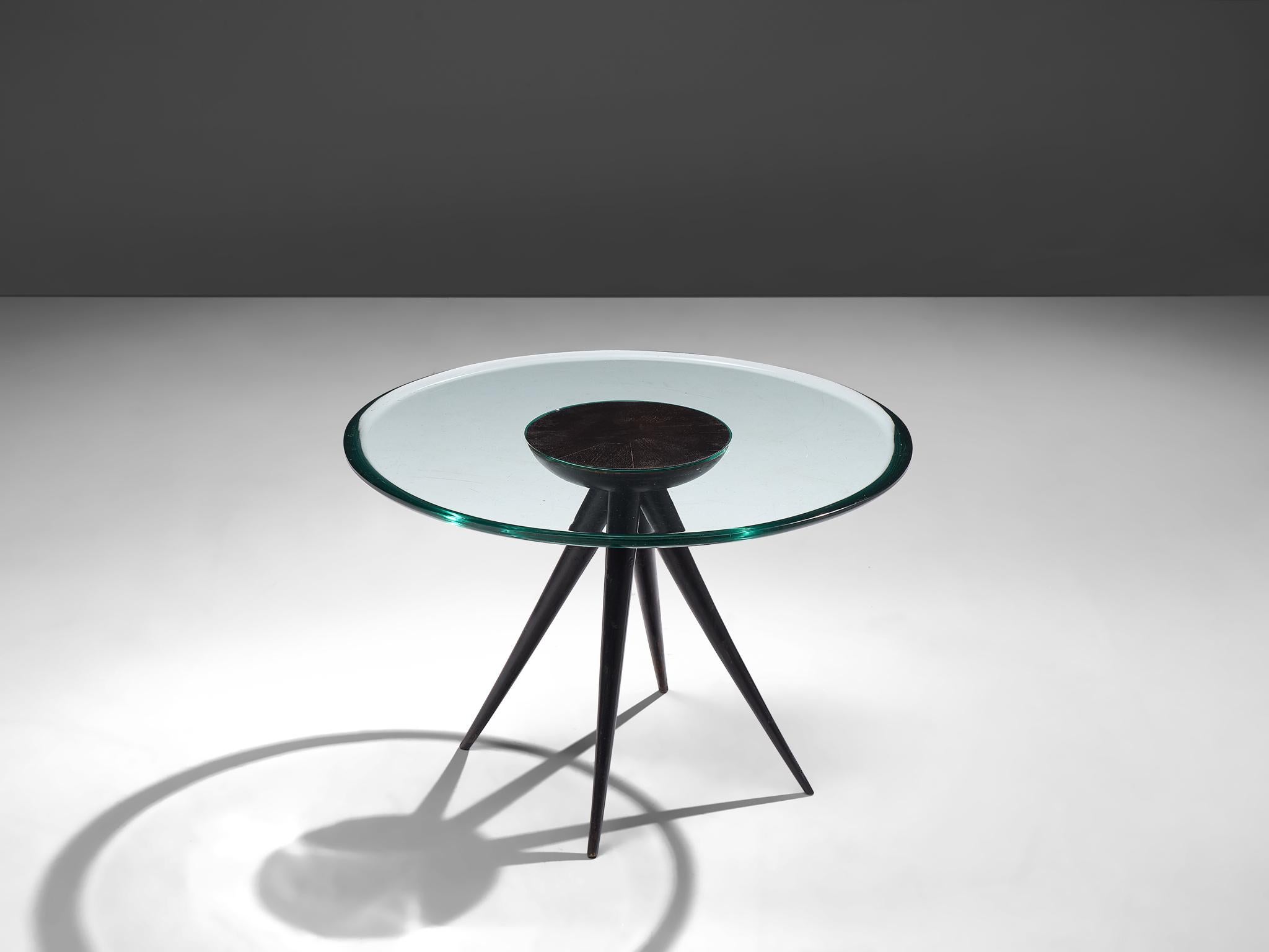 Pietro Chiesa for Fontana Arte, side table, glass and ebonized wood, Italy, 1941.

A rare side table designed by Pietro Chiesa by the premier Italian producer Fontana Arte, manufactured in 1941. The circular low table brings simplicity with