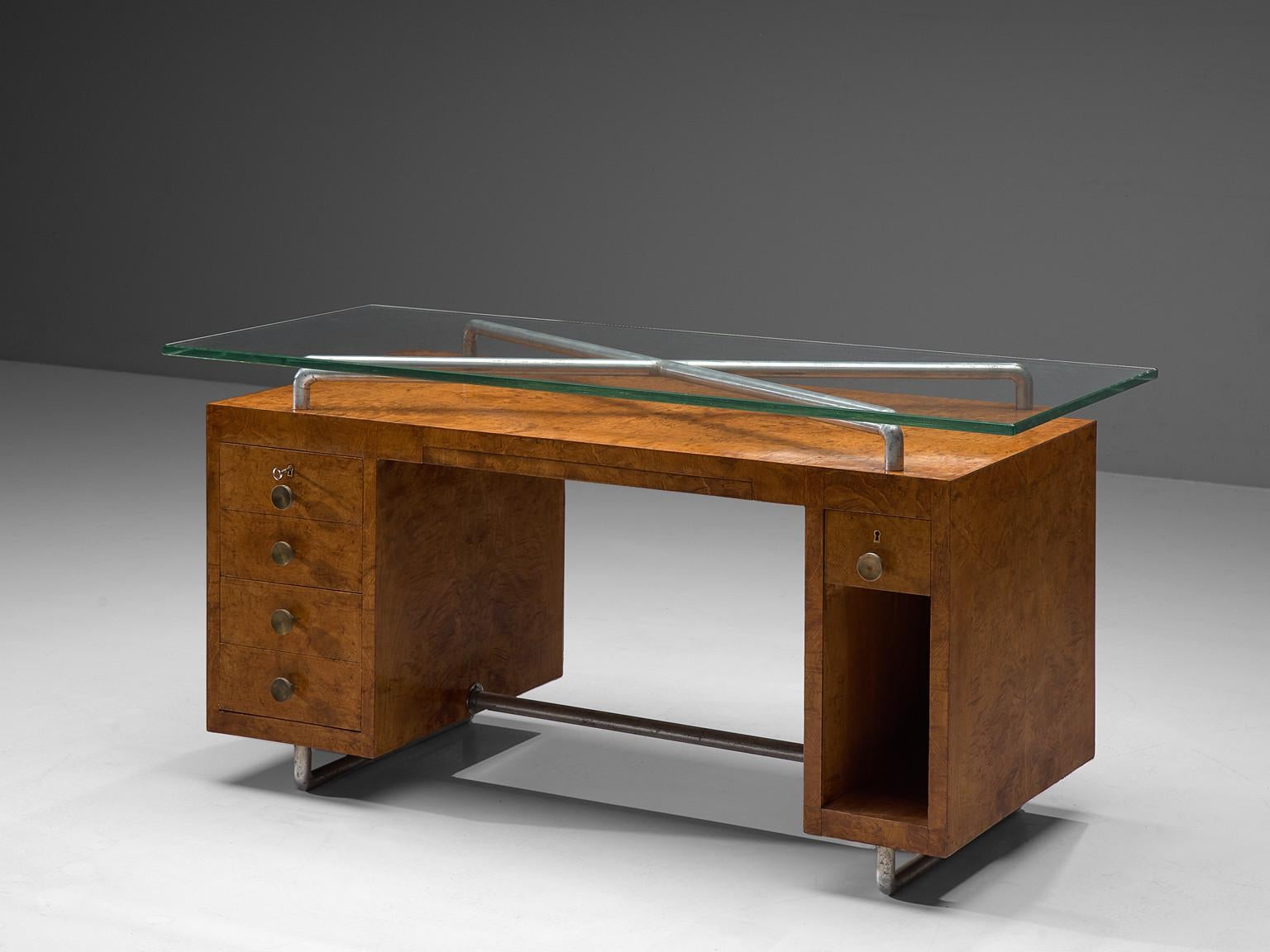 Pietro Lingeri, desk, briar root veneer, glass, brass, metal, Italy, 1930s

This rationalist desk is designed by the Italian architect Pietro Lingeri. The desk features several compartments and drawers with round brass handles. These conservative