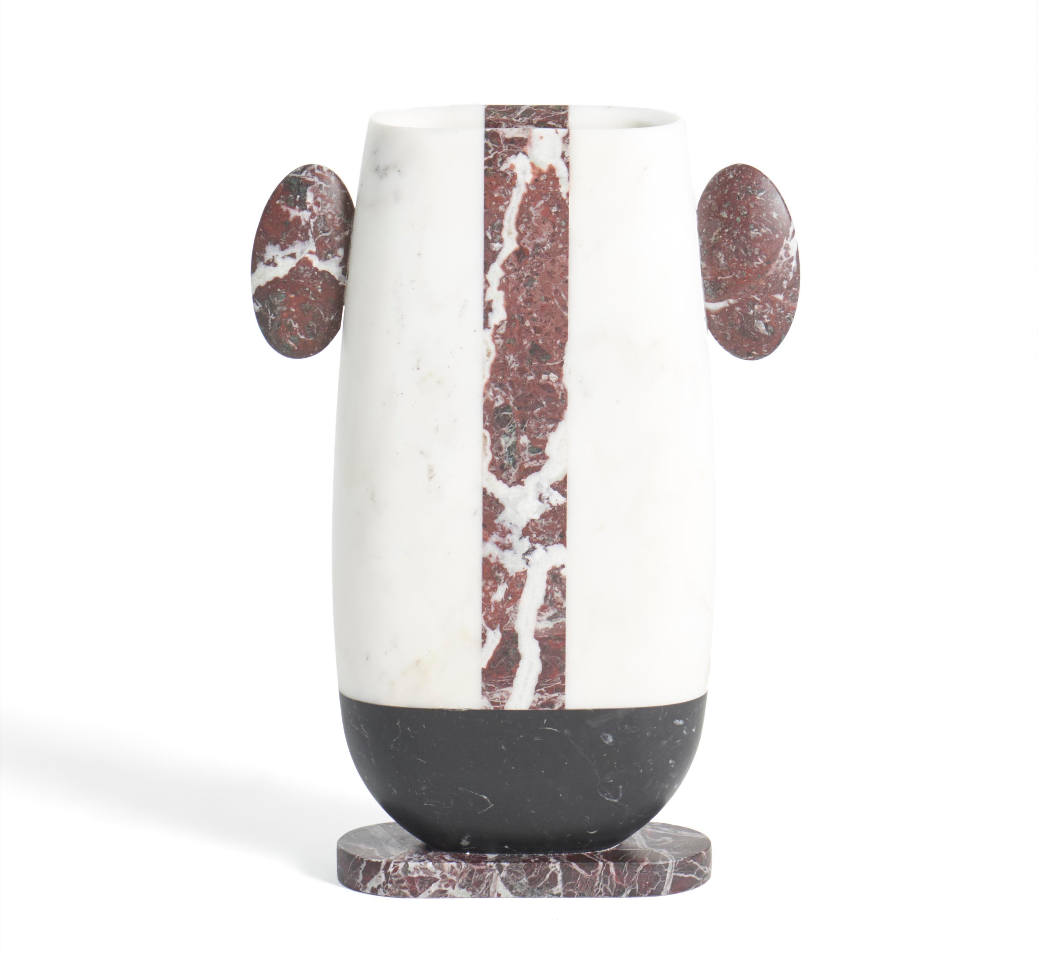 Pietro marble vase by Matteo Cibic
Dimensions: 10.7 x 2.9 x 15.1 cm
Materials: 
Bianco
Michelangelo,
Rosso Levanto

Vases made of various marbles cannot guarantee watertightness, better not use for cut flowers unless with the use vials for each