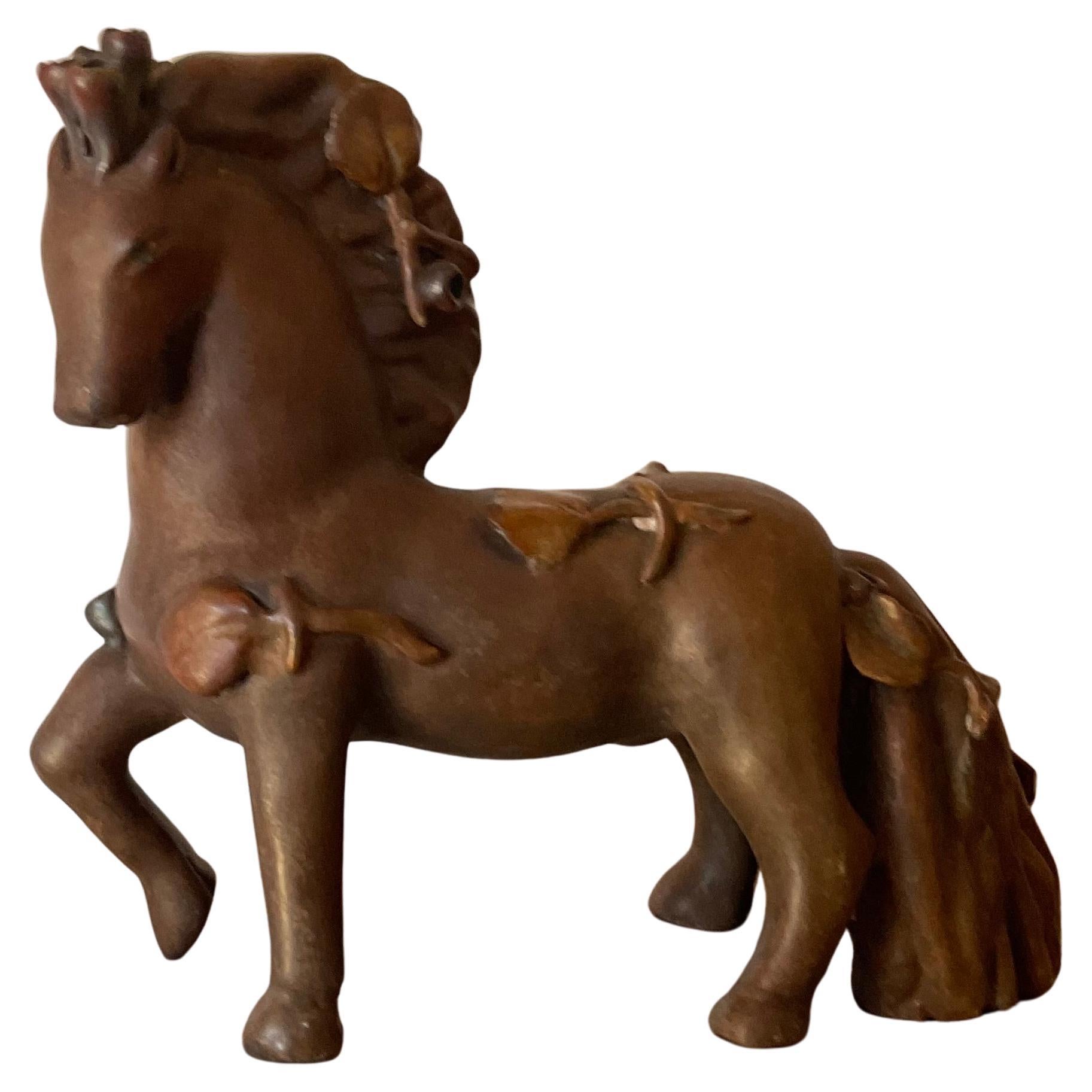 PIETRO MELANDRI - Cavallino in ceramica foglie in rilievo smaltate - ITALIA 1960 en venta
