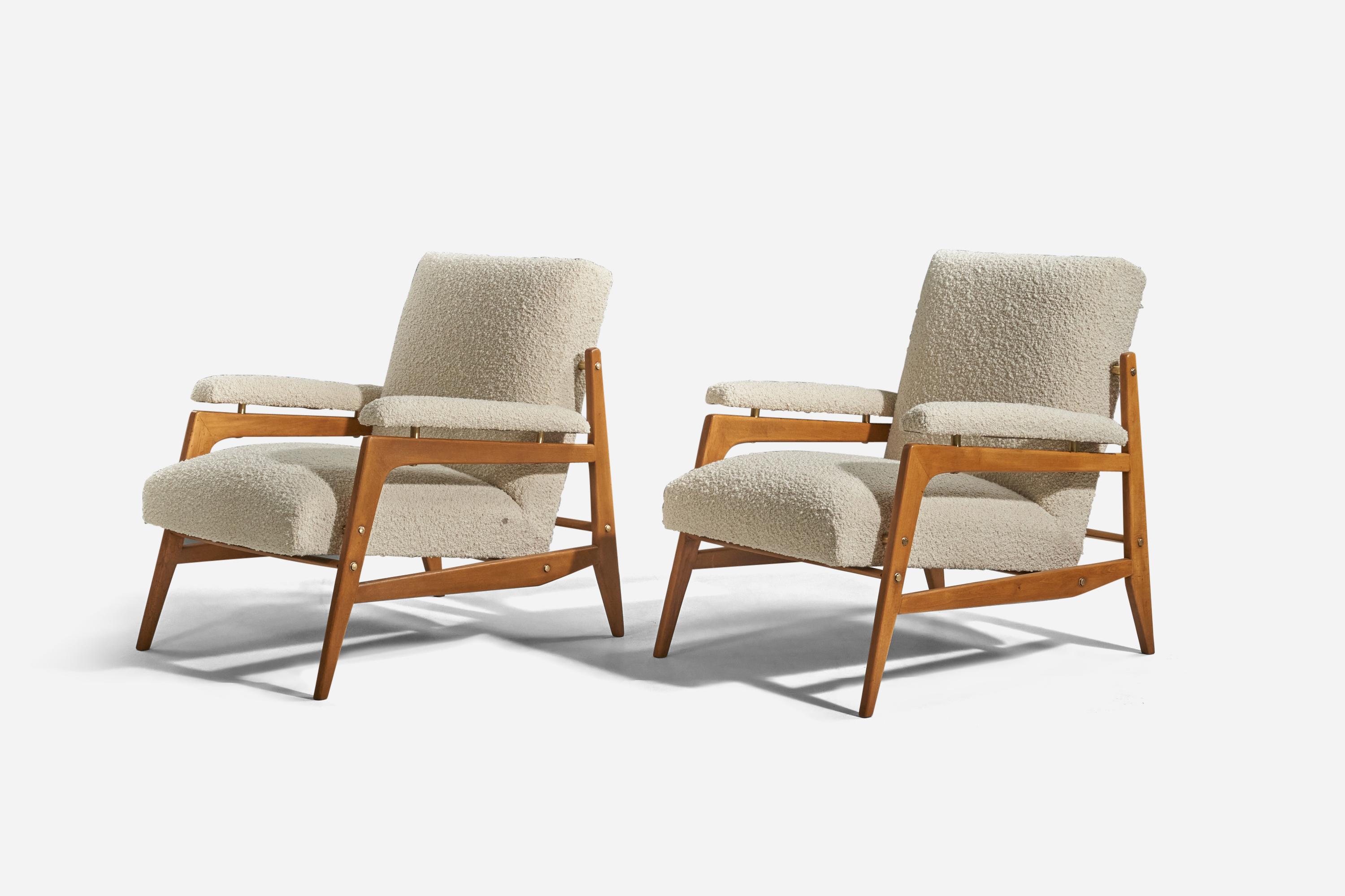 A pair of wood, brass and white fabric lounge chairs designed and produced in Italy, 1950s.

Literature: Mobili e mobilieri d'Italia, 1961, p. 189.
  