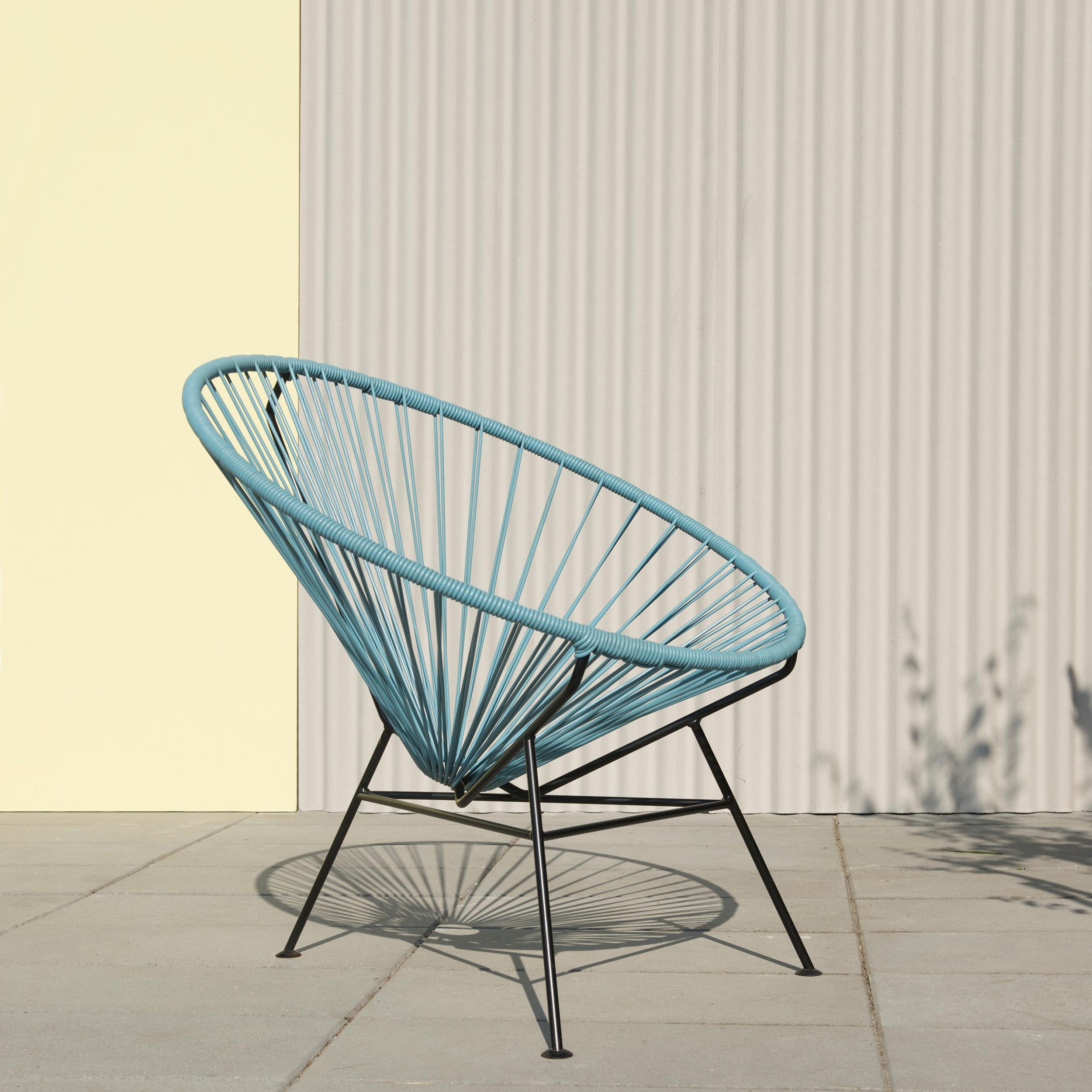 Pigeon Blue Condesa Chair by OK Design
Dimensions: D 80 x W 80 x H 78 cm.
Materials: Powder-coated metal, PVC cord.

Available with black frame, or white frame.
Available in other colors. Please contact us.

The Condesa chair takes its name from the