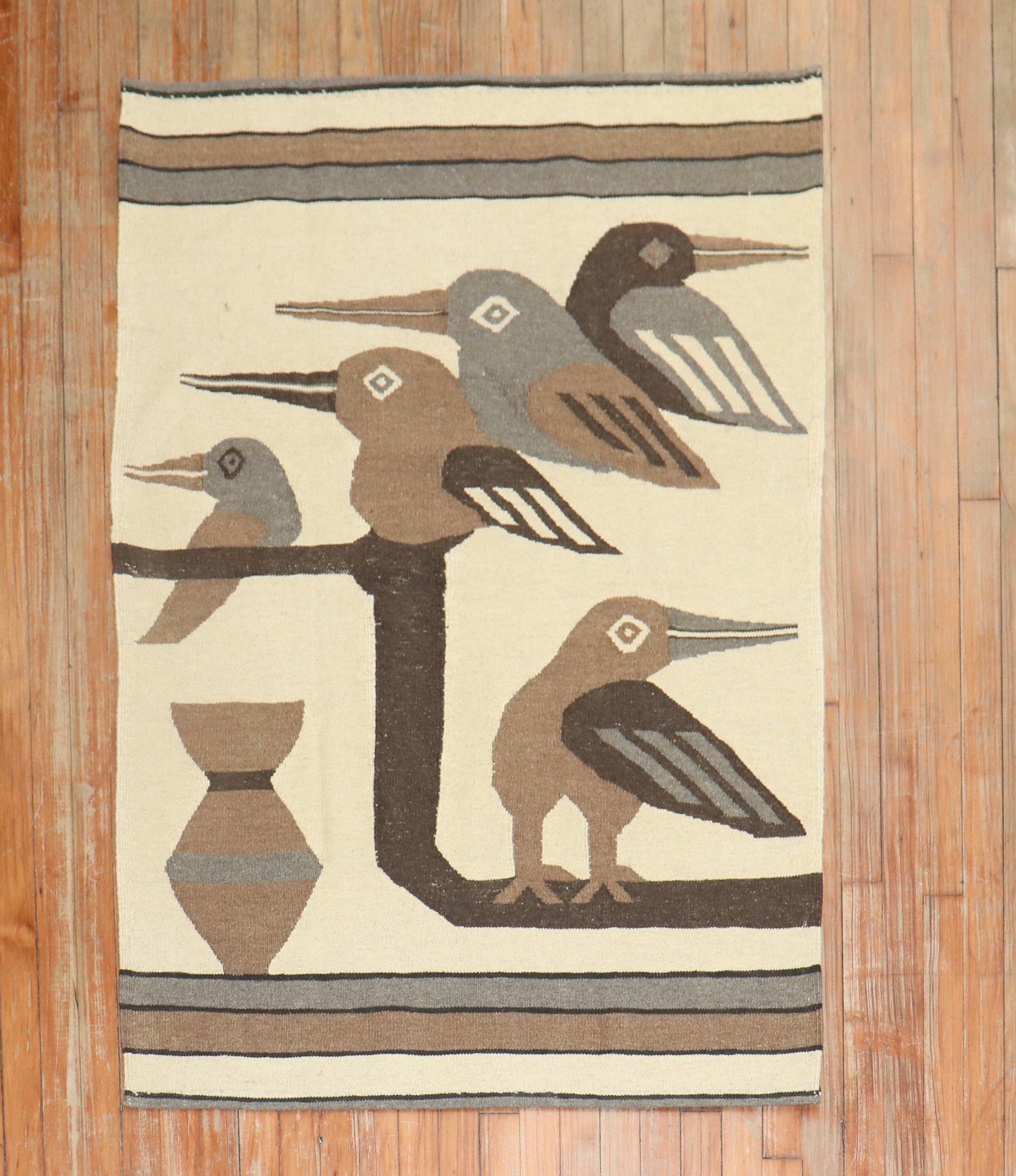 Scatter size Persian Kilim from the late 20th century with a flurry of pigeons in beige, gray, and brown

This was originally belonging to a private Persian collector who requested to make a custom collection of flat-weaves with quirky themes and