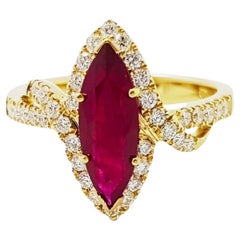 Anello con rubino Pigeon's Blood e diamanti con montatura in oro 18K