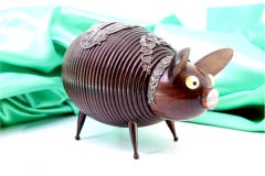 Piggy bank in rosewood shape in the shape of a pig with silver applications