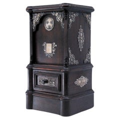 Hucha de palisandro con aplicaciones de plata