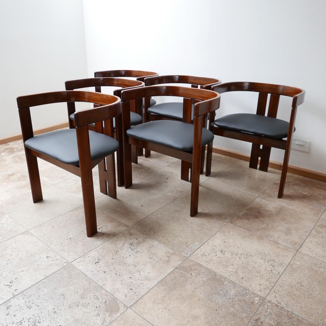 A run of six dining chairs, attributed to Tobia Scarpa, as the 'Pigreco' model. 

Italian, c1950s.

A set of chairs that look good from any angle. 

Some wear consistent with age (see photos).
Re-covered in premium black leather. 

Dimensions: 45 D