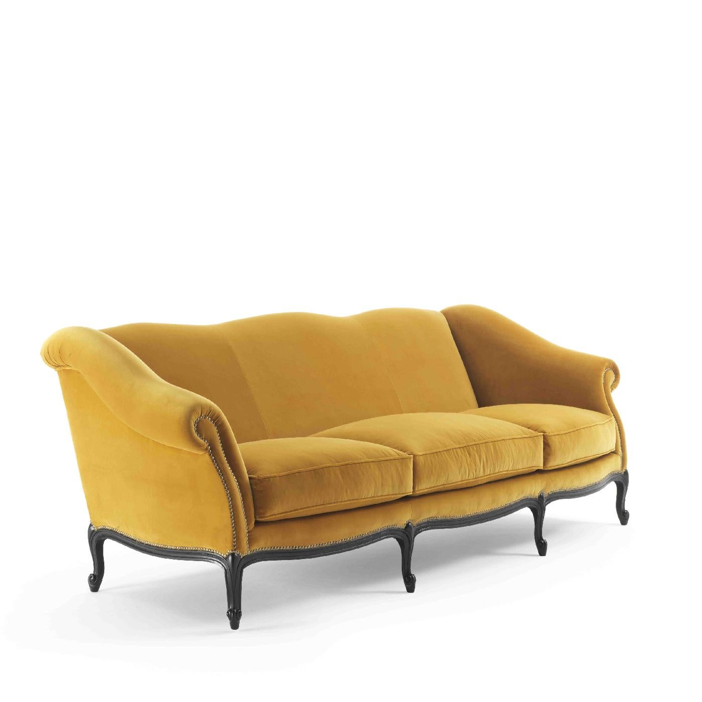 A design that will stand out in any decor, the sofa's sinuous silhouette offers real comfort and elegant style. The plush ocher upholstery (FA808 Cat. B) is accented with satin brass nails along the profile of the arms and undulated base with six