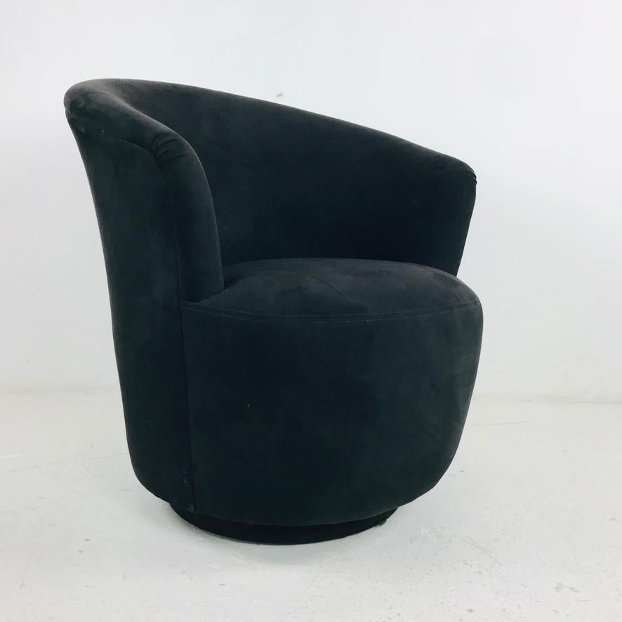 Black swivel chair in pigskin suede. By Century Furniture Co.