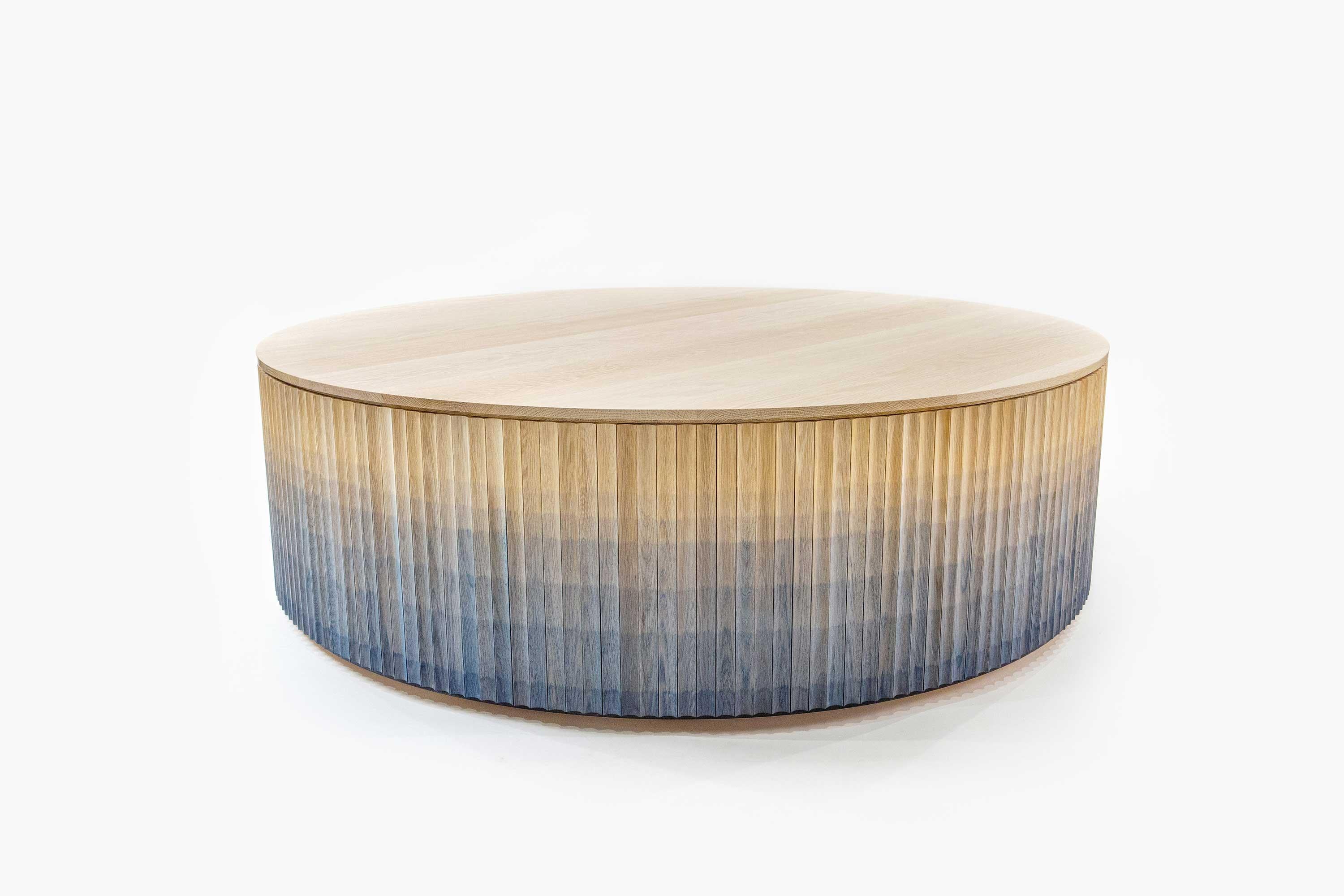 Pilar coffee table by INDO-
One of a kind
Dimensions: Ø 99 x H 38.1 cm 
Materials: Oak with ombre finish, Hardwood Top

Also available in other colors and materials.
Each piece is carefully handcrafted by our team using natural materials and