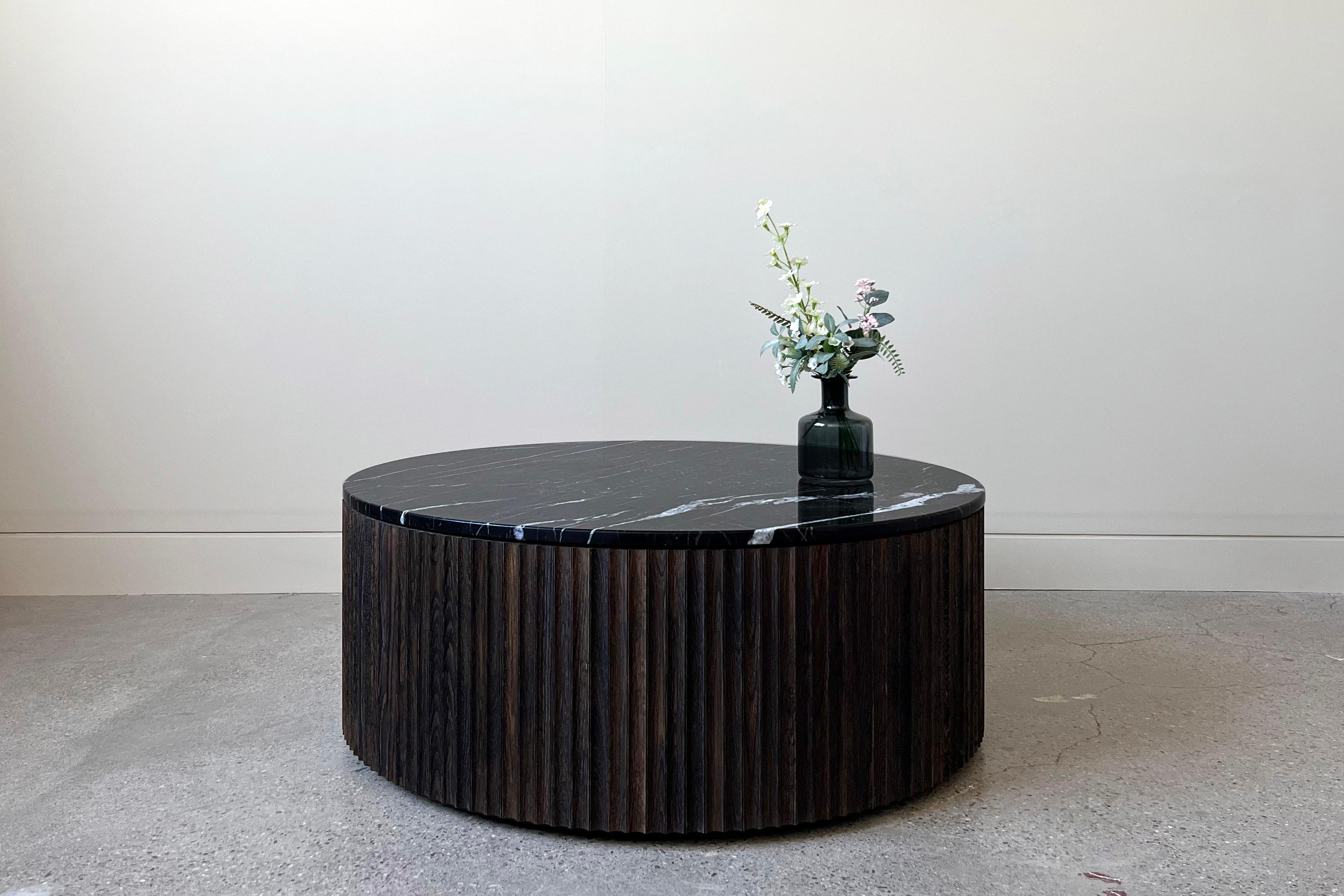 Hand-Crafted Pilar Round Coffee Table / Oxidized Oak Wood, Nero Marquina Marble Top by INDO- For Sale