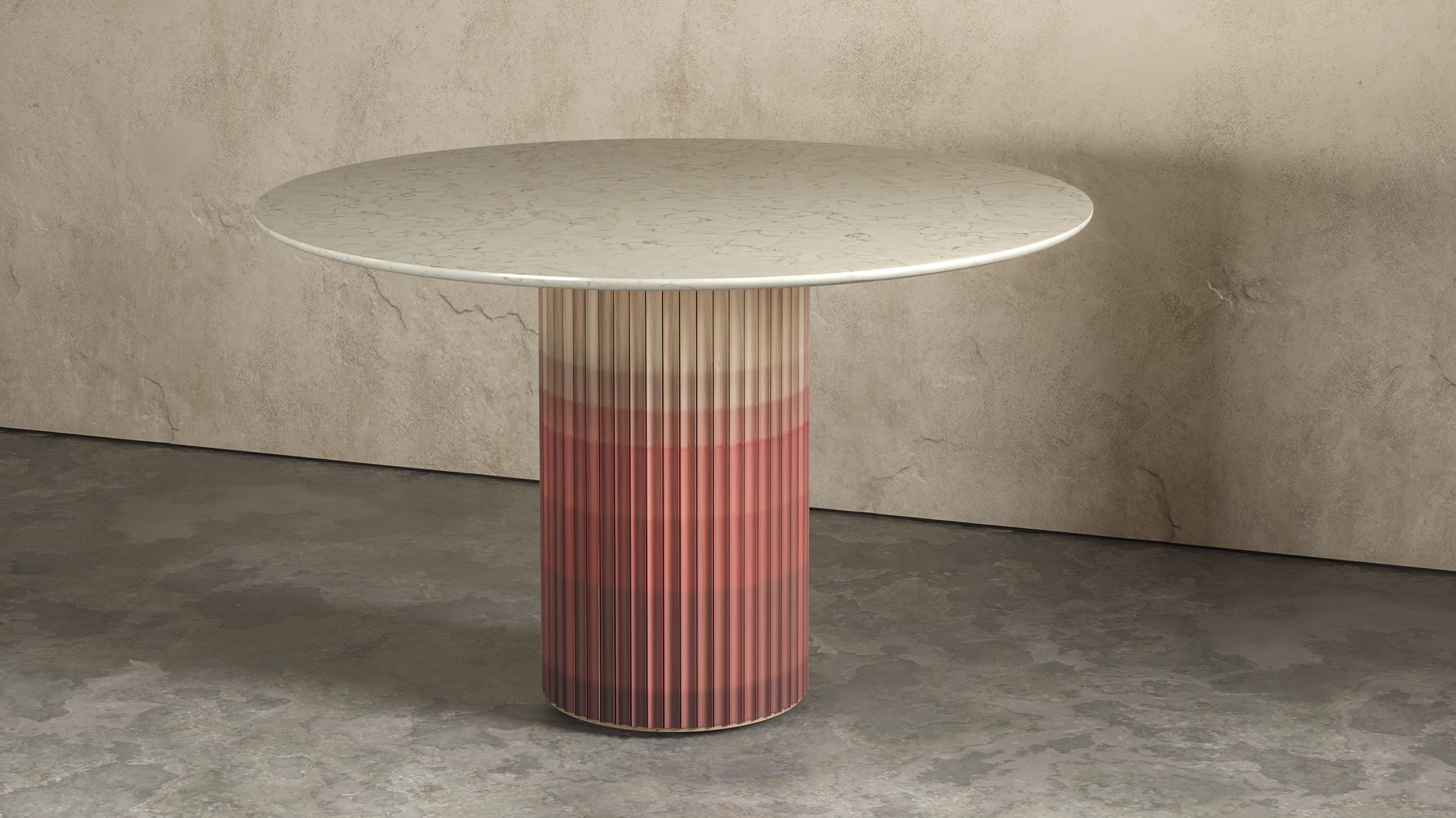 Pilar round dining table by Indo Made
One of a kind.
Dimensions: Ø122 x 76.2 cm 
Materials: Maple with copper red ombre finish, White Carrara marble top.

Also available in other materials and finishes.
Each piece is carefully handcrafted by