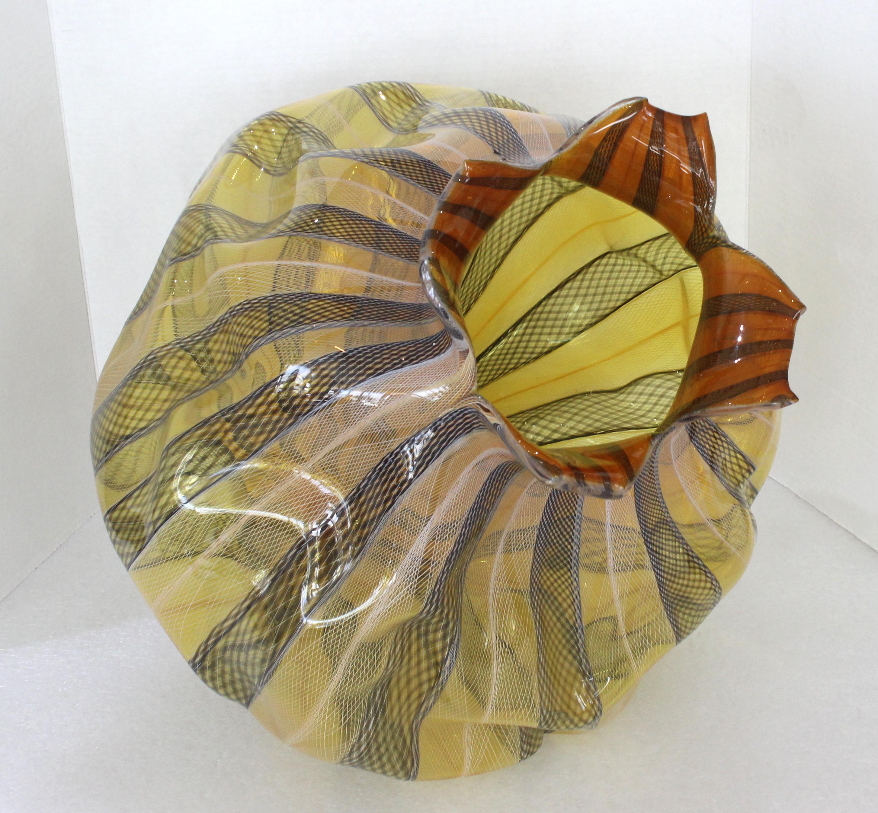 This large scale artisan glass vase is very much in the manner of pieces created by the Pilchuk Glassworks.