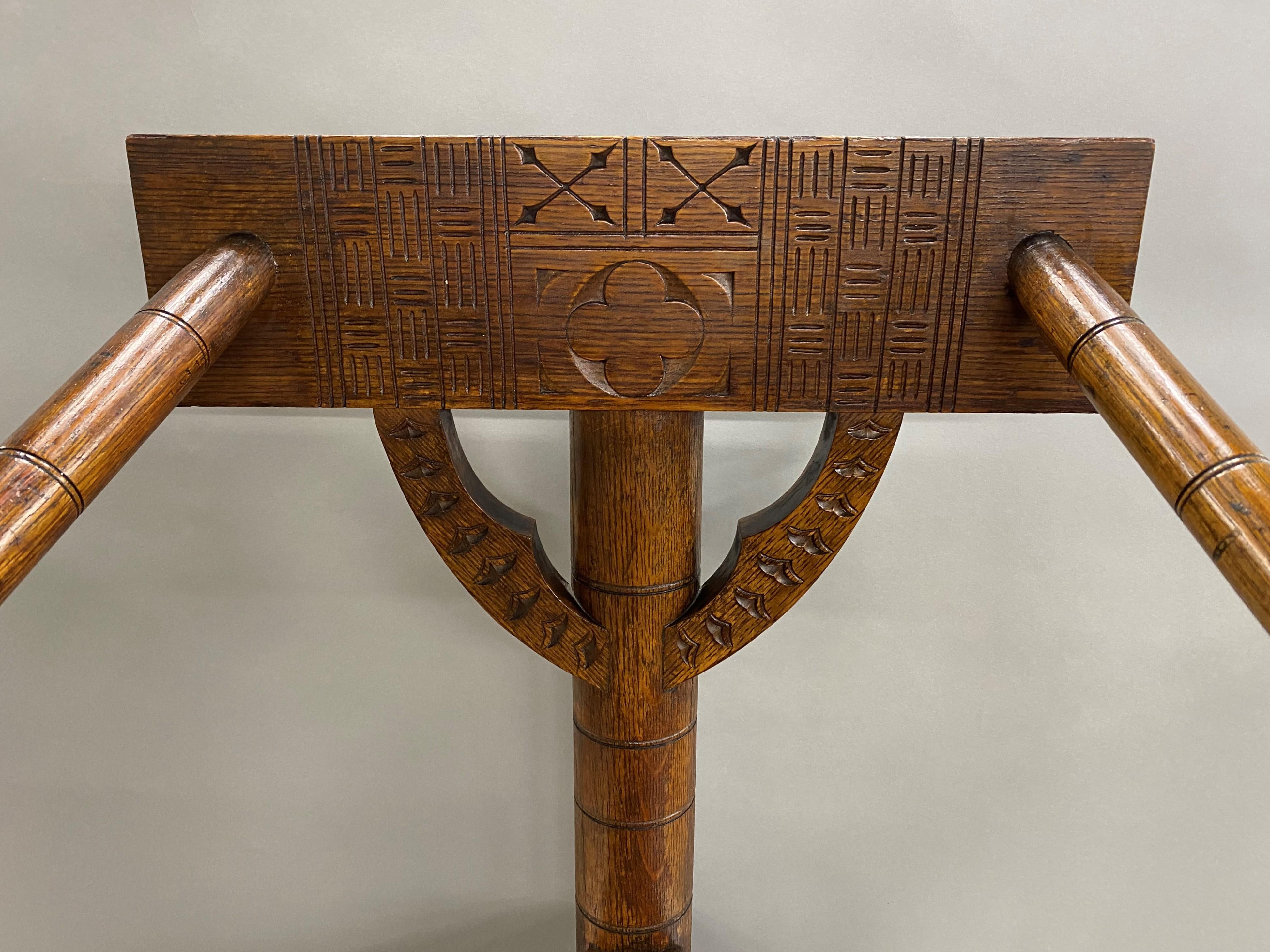 A fine example of a sturdy pilgrim century style carved oak Turner's corner chair. Similar to a labeled example by J.B.Cheyney and Company of Warwick, England, circa 1900. (See photograph of label, note that this label is not on this chair). Chair