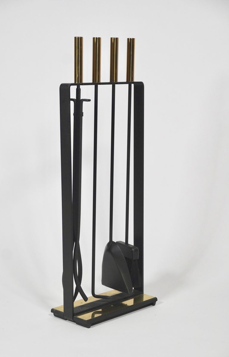 Pilgrim Fireplace Tools in Brass and Black Metal For Sale at 1stDibs