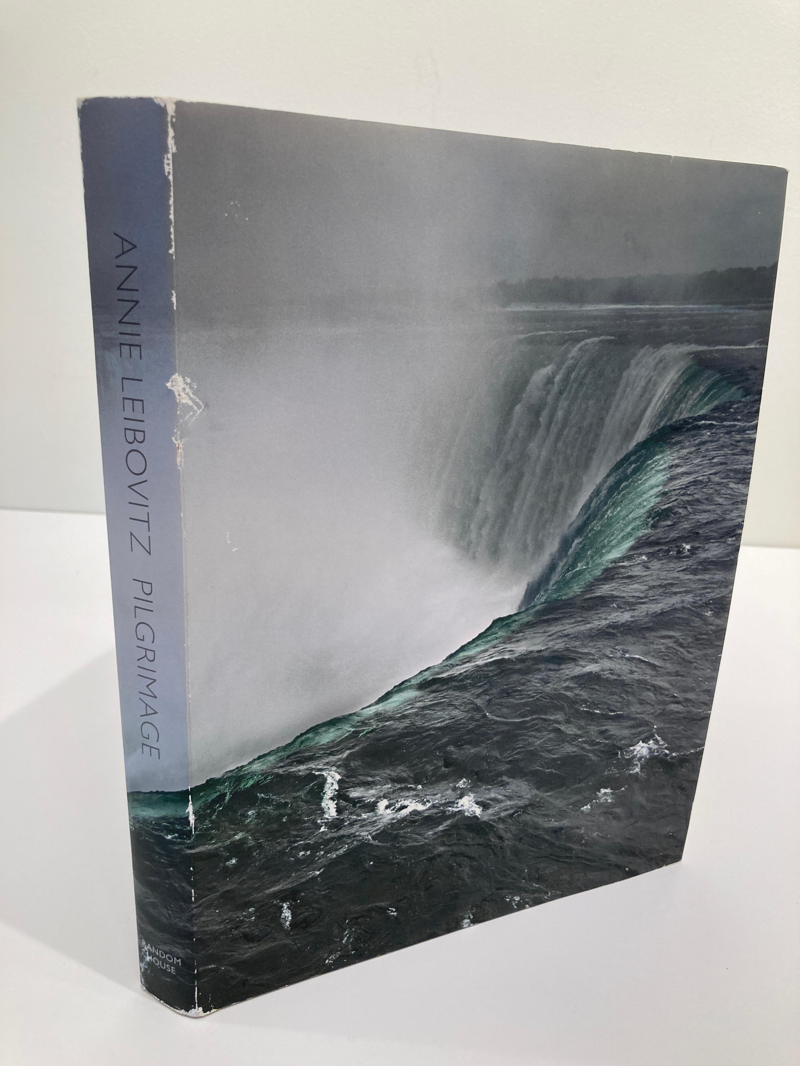 Pilgrimage by Annie Leibovitz Hardcover Book 2011.
Large heavy book.
Pilgrimage took Annie Leibovitz to places that she could explore with no agenda. She wasn’t on assignment. She chose the subjects simply because they meant something to her. The