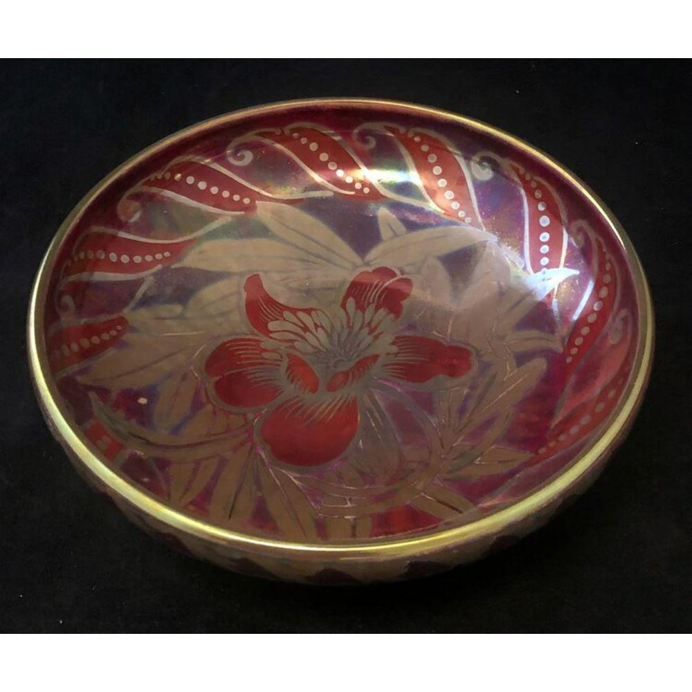 Pilkington's Lustre Bowl decorated with a central finely painted flower by William Slater Mycock 1931

Dimensions: 23cm wide, 12cm high

Complimentary Insured Postage
14 Day Money Back Guarantee
BADA Member – Buy the Best from the Best