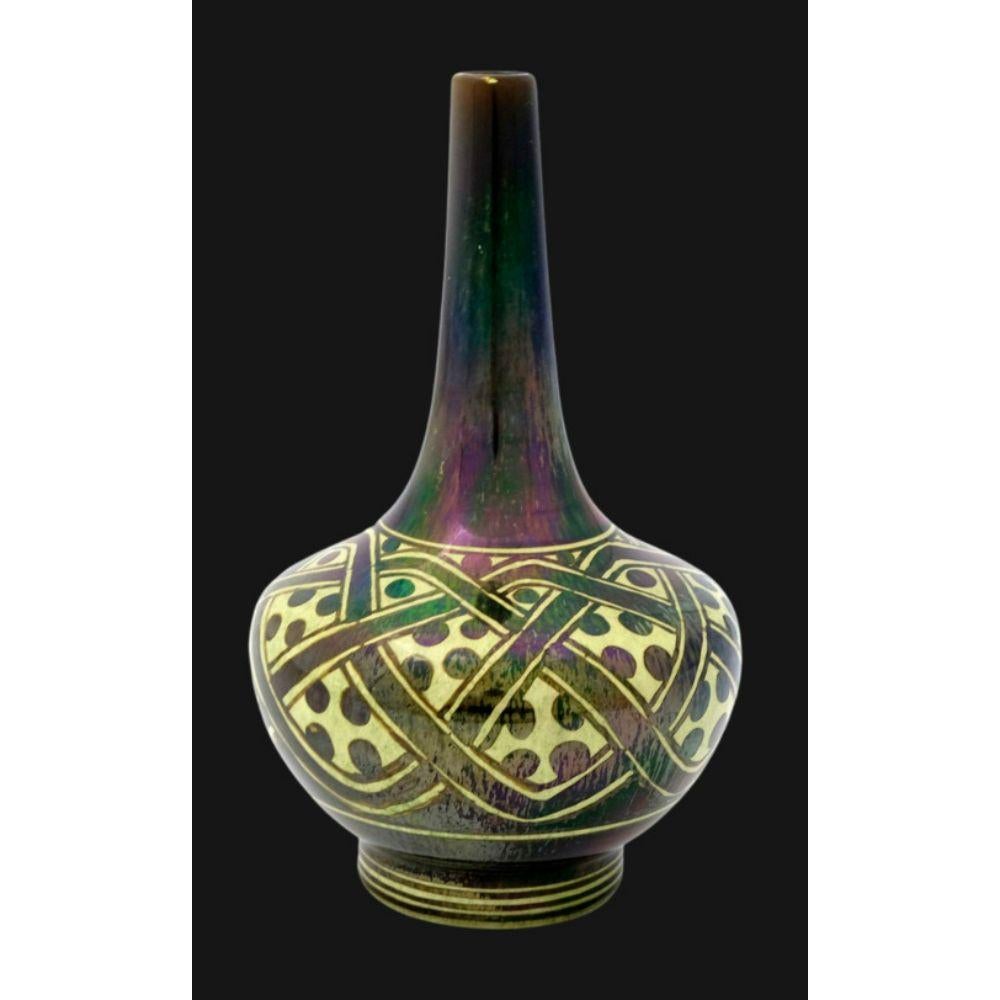 5184 Pilkington’s Lustre vase decorated in an unusual geometric design and Polka Dots by Gordon Forsyth

Dated 1919

Dimensions: 22cm high

Exhibited with Richard Dennis 1980
Featured in Cross’s Book “Pilkington’s Royal Lancastrian
