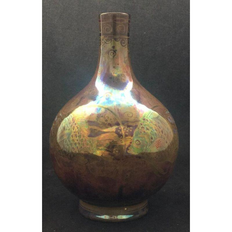 Pilkington's Lustre Vase decorated with Fish by Richard Joyce Dated 1910

Dimensions: 19cm high, 11cm wide

Complimentary Insured Postage
14 Day Money Back Guarantee
BADA Member – Buy the Best from the Best