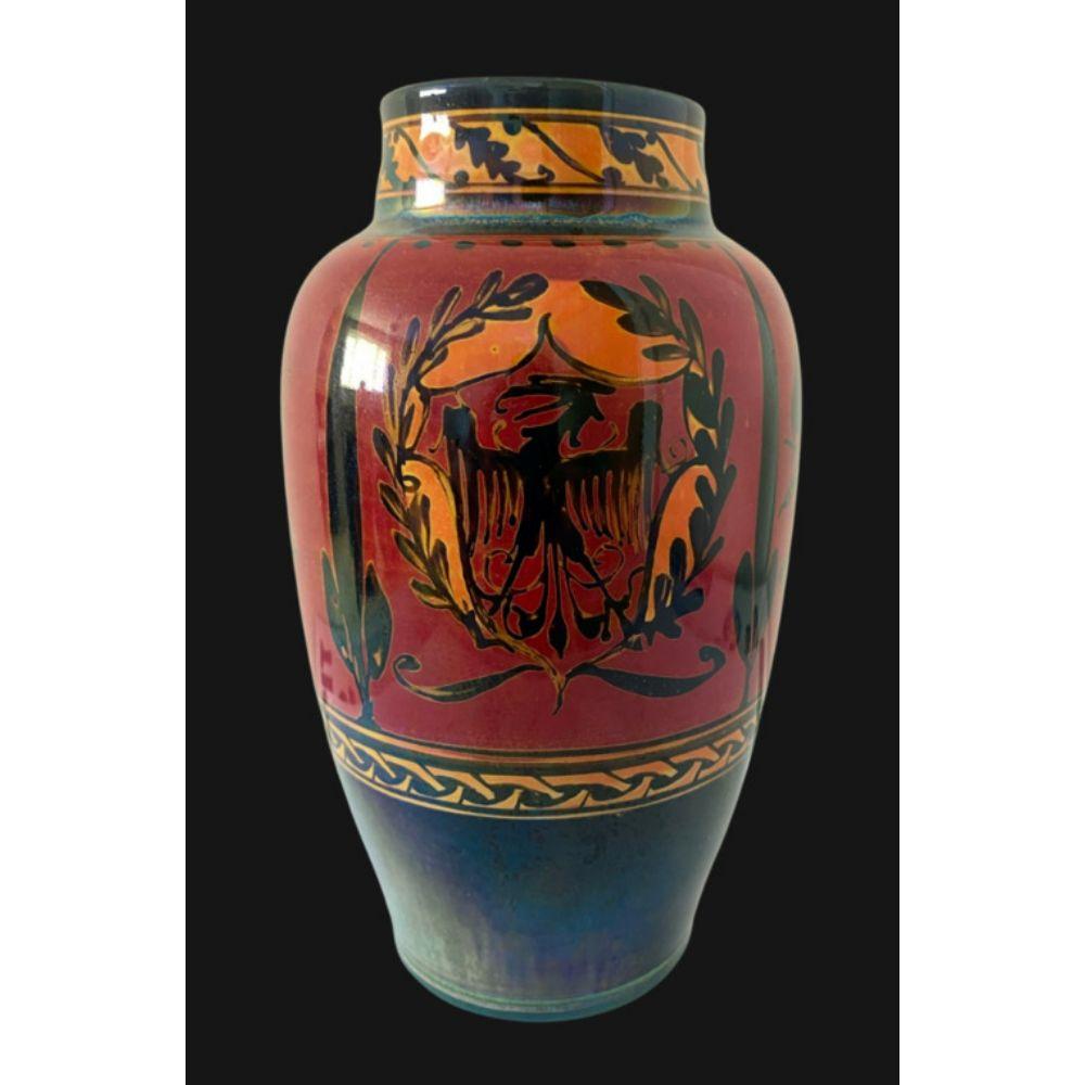 5168 Pilkington’s Royal Lancastrian Lustre Vase decorated with galleons and Eagles by Director or Art Gordon Forsyth.

Dated 1913

Dimensions: 16.5cm high

Complimentary Insured Postage
14 Day Money Back Guarantee
BADA Member – Buy the Best from the