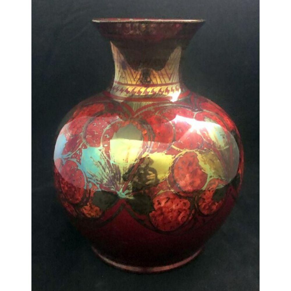 Pilkingtons Lustre Vase decorated with stylised fruit and leaves by Gladys Rogers Circa 1920s

Dimensions: 26.5cm high

Complimentary Insured Postage
14 Day Money Back Guarantee
BADA Member – Buy the Best from the Best