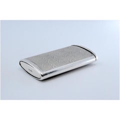 Pill box in guilloche silver with sliding lid