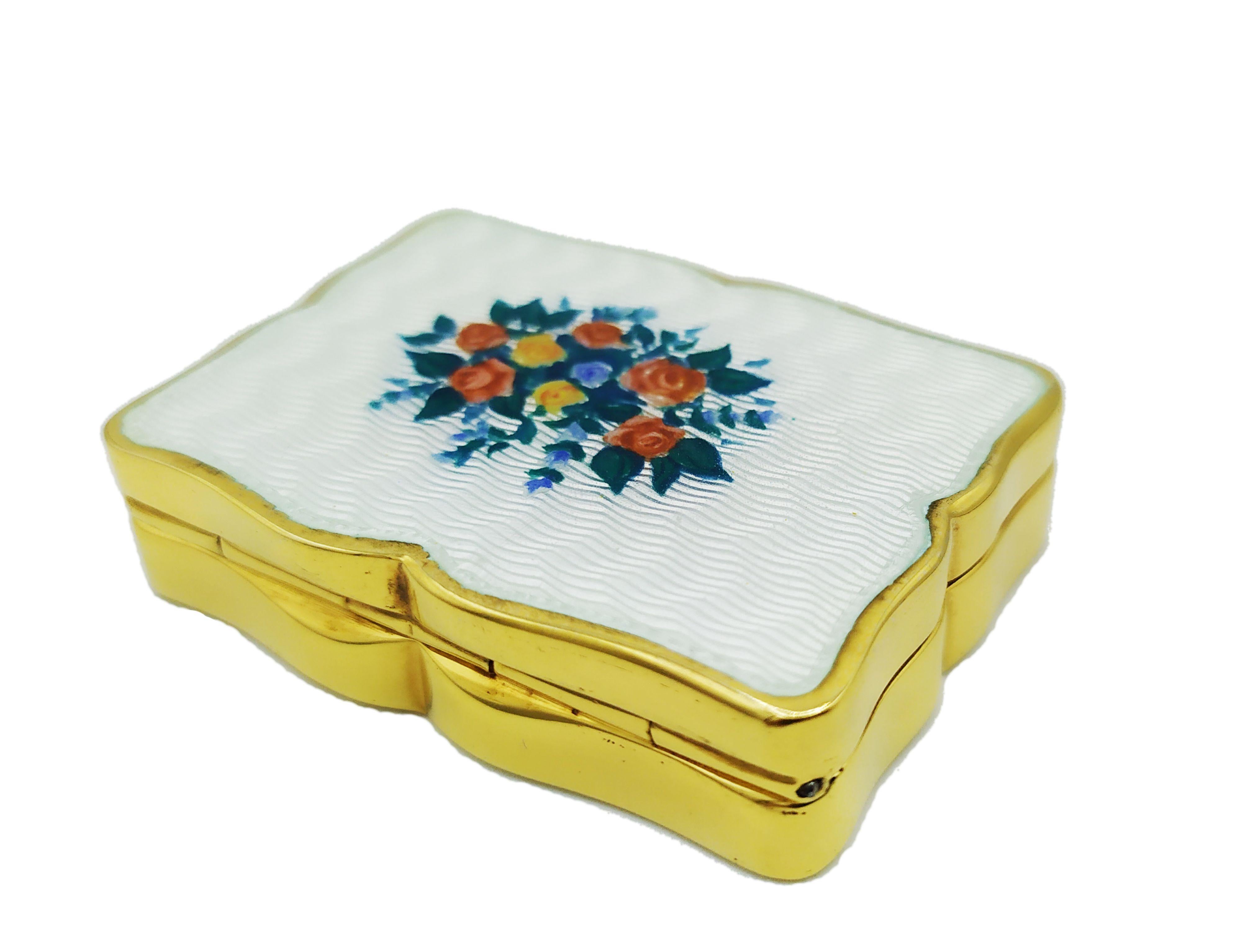Shaped pillbox 925/1000 sterling silver gilt with translucent fire enamels on guilloche and hand-painted floral miniature. Viennese Art Nouveau style second half of the 19th century. Measure cm. 3.5 x 5.7 x 1.1. Weight gr. 50 - Produced in Florence