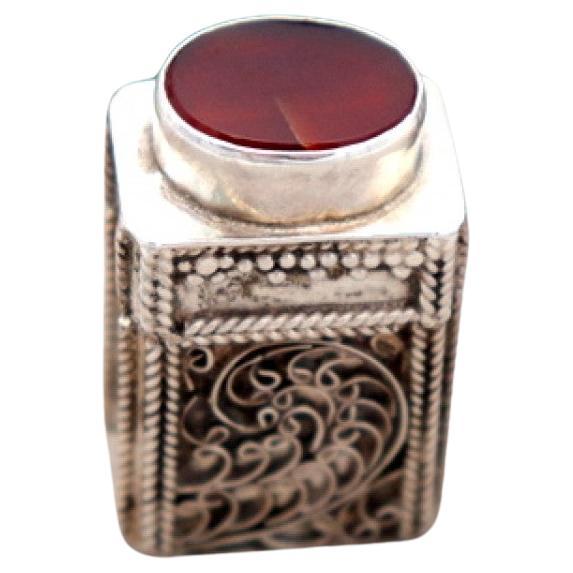 Pill box with filigree reliefs