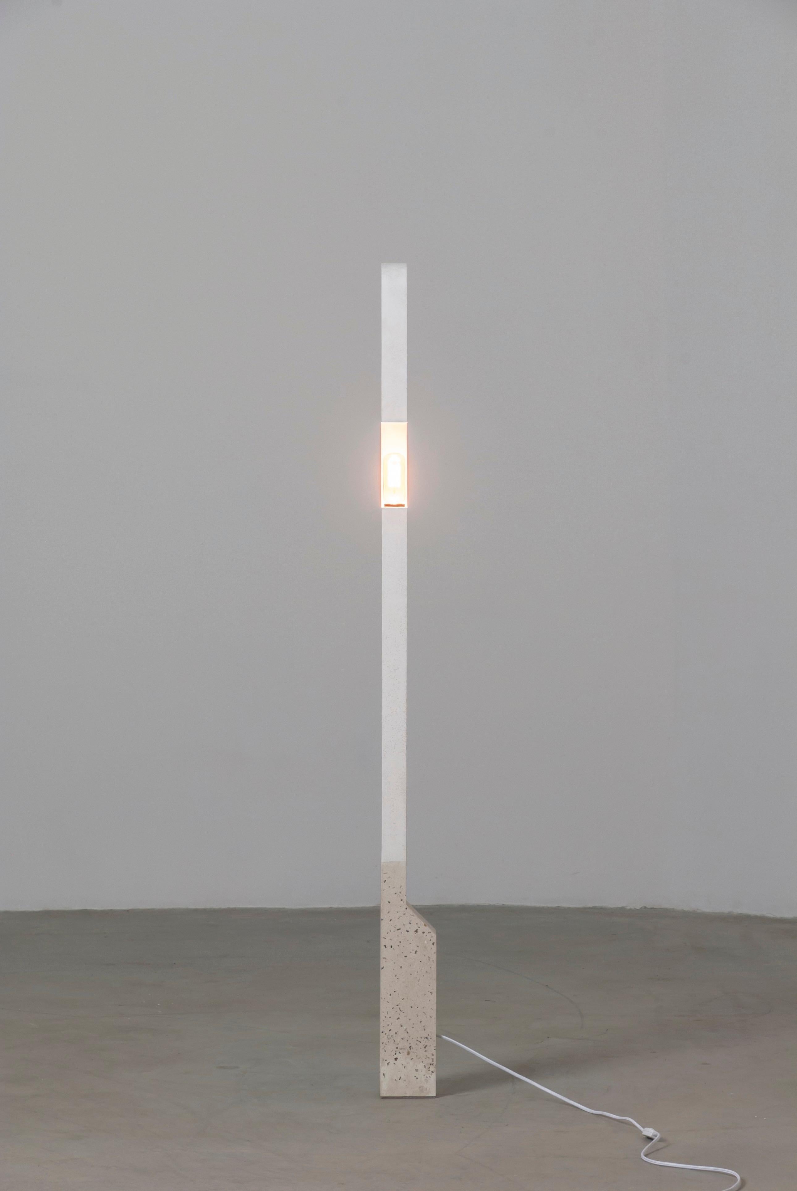 Inspired by empty windows and Brutalist architecture, the pillar floor lamp exemplifies cast concrete by using different concrete mixes to create stability within the piece.