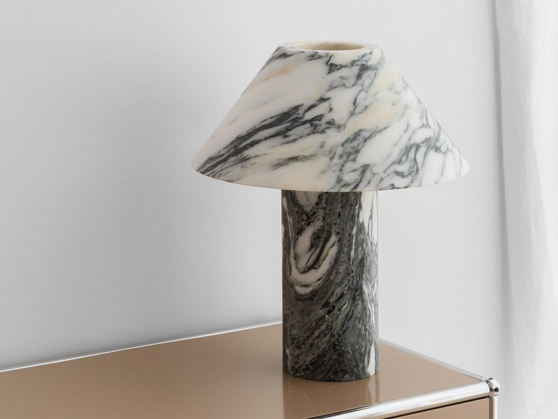 Pillar lamp in Arabescato marble by Henry Wilson
Dimensions: 40 x 12 x 35 cm
Materials: Arabescato marble

Pillar Lamp is hewn from two pieces of solid Arabescato Marble. It is heavy and will require care in transport and a sturdy surface to