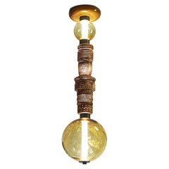 Pillars of Meerschaum: Amber Treasure in Blown Glass and Brass by Feyza