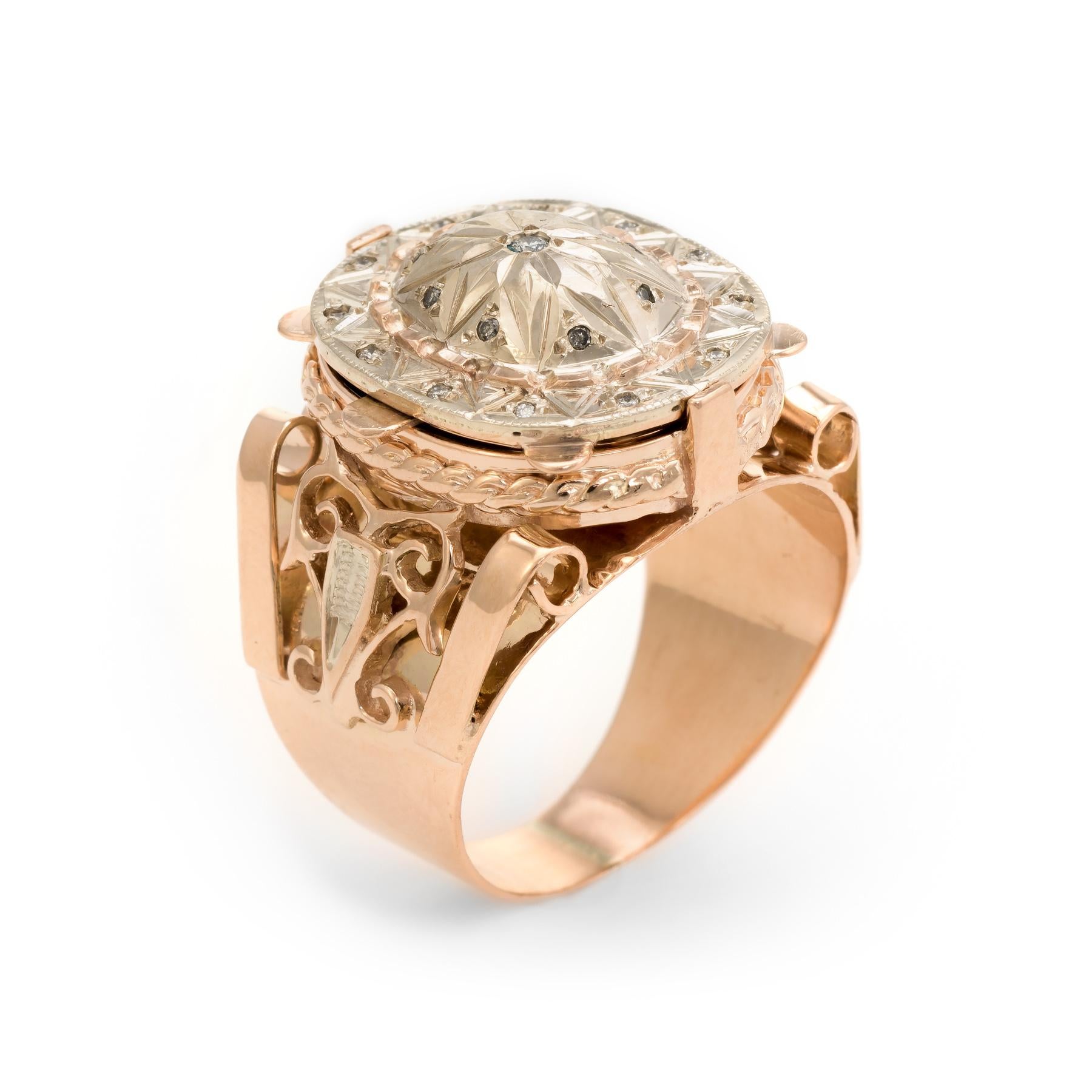 Striking vintage cocktail ring (circa 1960s), crafted in 14 karat rose & white gold. 

Diamonds total an estimated 0.08 carats (estimated at I-J color and SI2-I1 clarity). 

The ring features a hinged mount that opens to reveal a secret compartment.