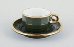 Pillivuyt, France. Four coffee cups with saucers, creamer and sugar bowl