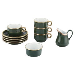 Pillivuyt, Francia. Cuatro tazas de café con platillos, cremera y azucarero