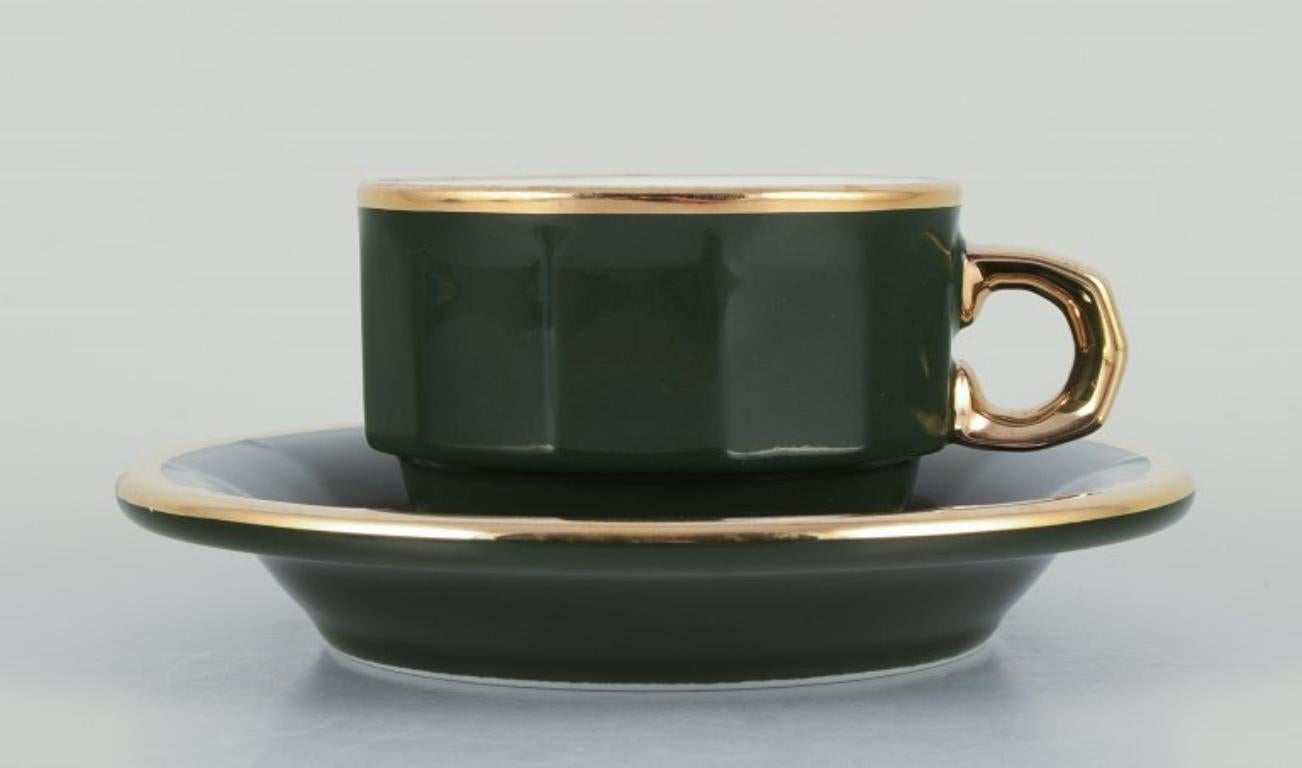 French Pillivuyt, France. Four pairs of coffee cups with matching saucers.
