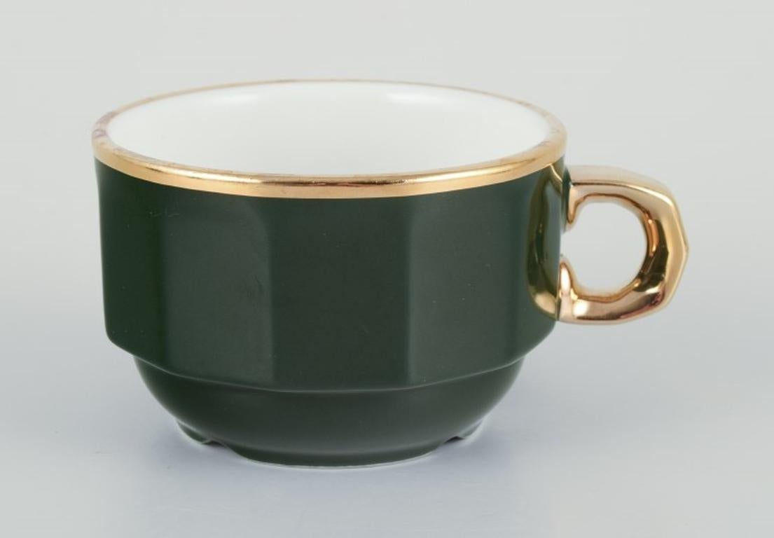 Glazed Pillivuyt, France. Four pairs of coffee cups with matching saucers.