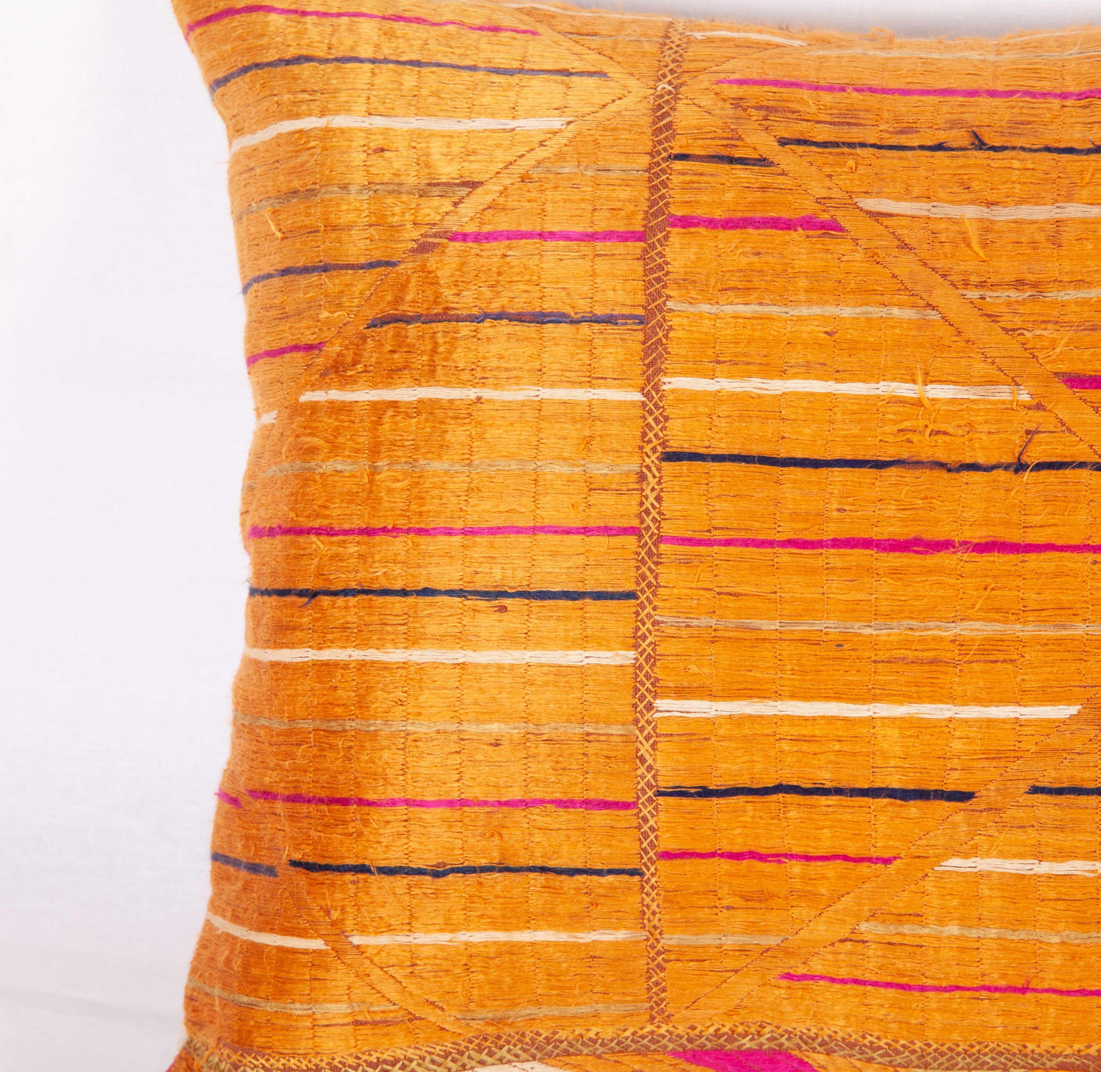 Pillow case was fashioned from an early 20th century wedding shawl from Punjab, India.
Linen in the back.
It does not come with an insert but a bag made to the size to accommodate insert materials.
 