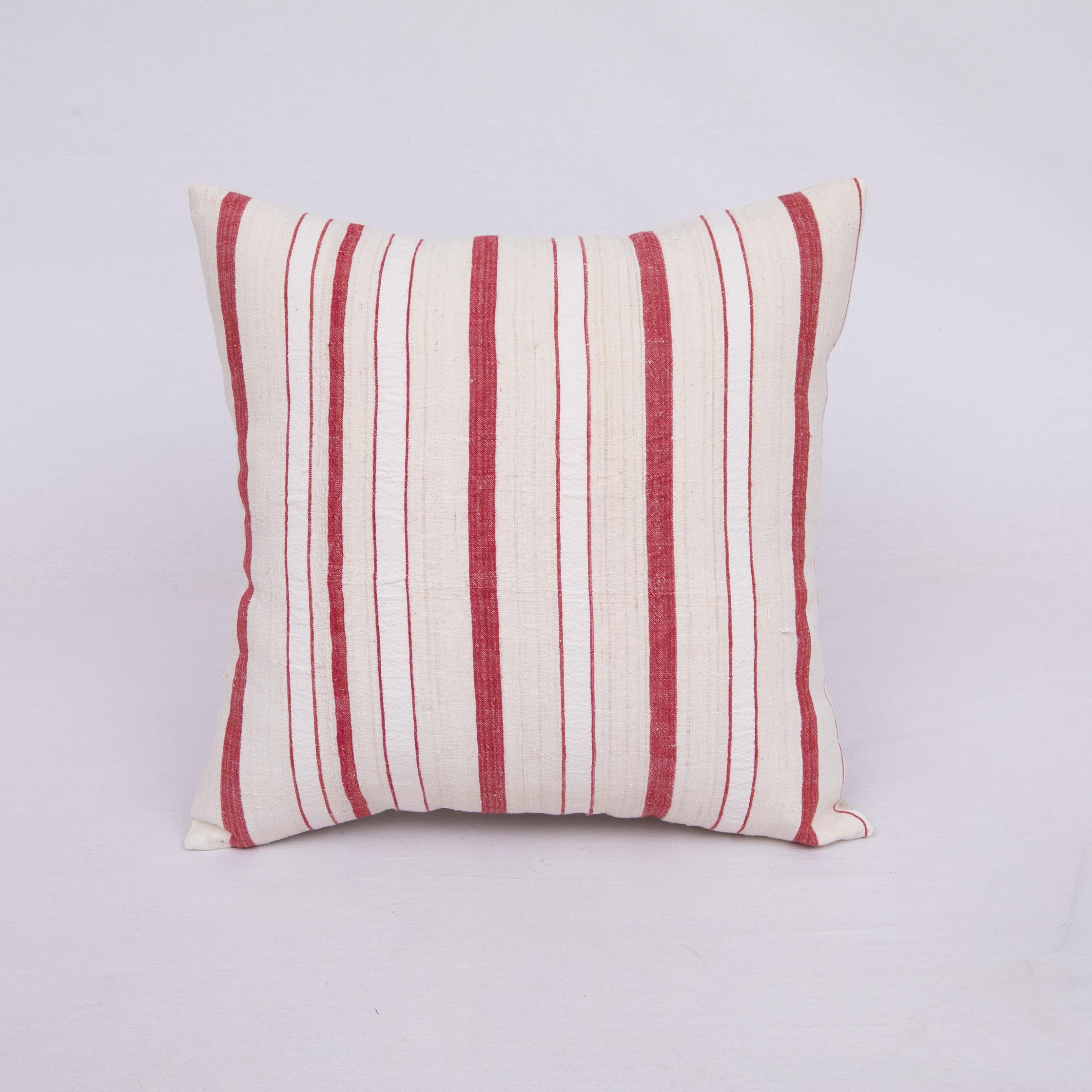 Pillow Cover is made from a hand woven cotton fabric, woven in Anatolia, Turkey.
It does not come with an insert.
Cotton in the back.
Zipper closure.
Dry clean is recommended.
   