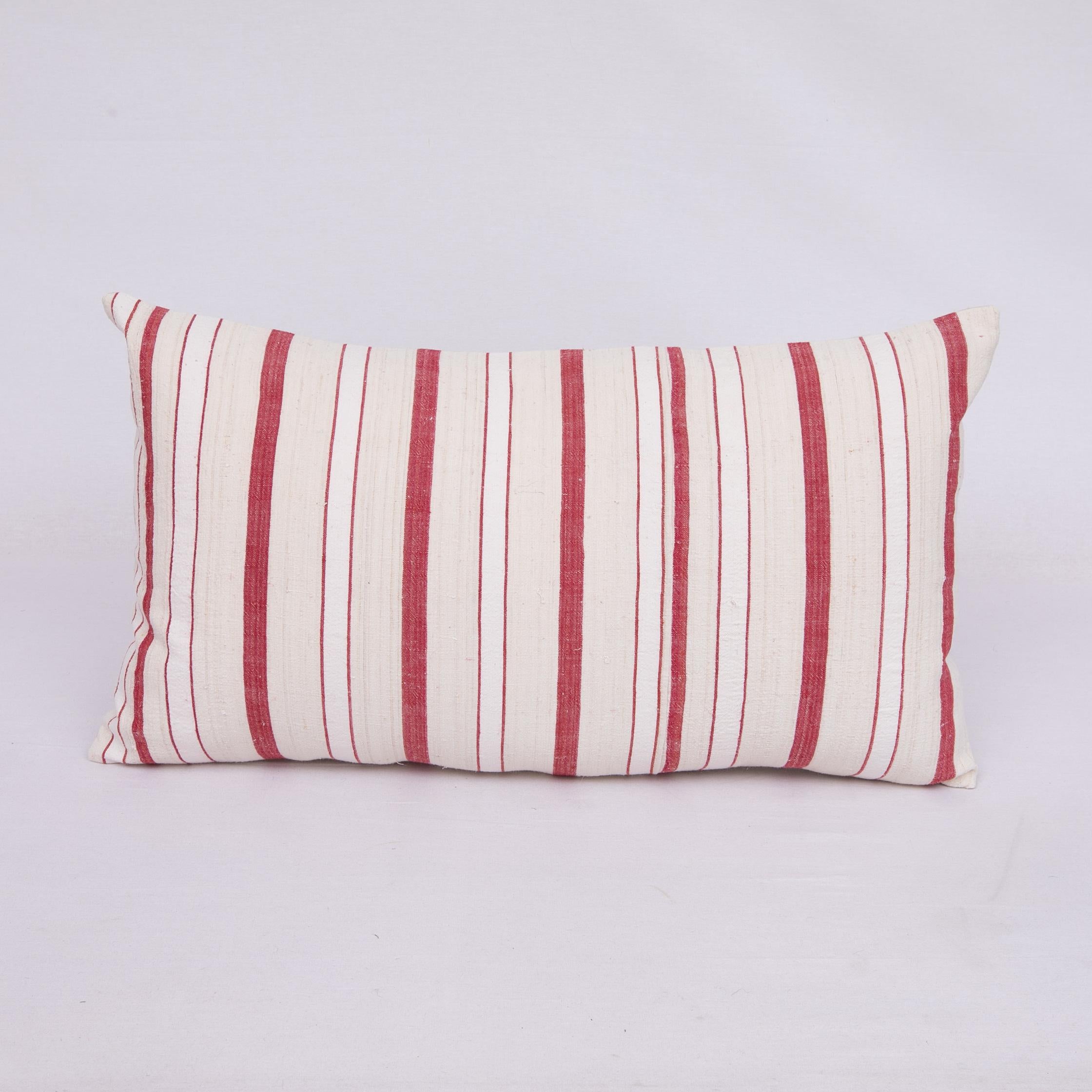 Pillow Cover is made from a hand woven cotton fabric, woven in Anatolia, Turkey.
It does not come with an insert.
Cotton in the back.
Zipper closure.
Dry clean is recommended.