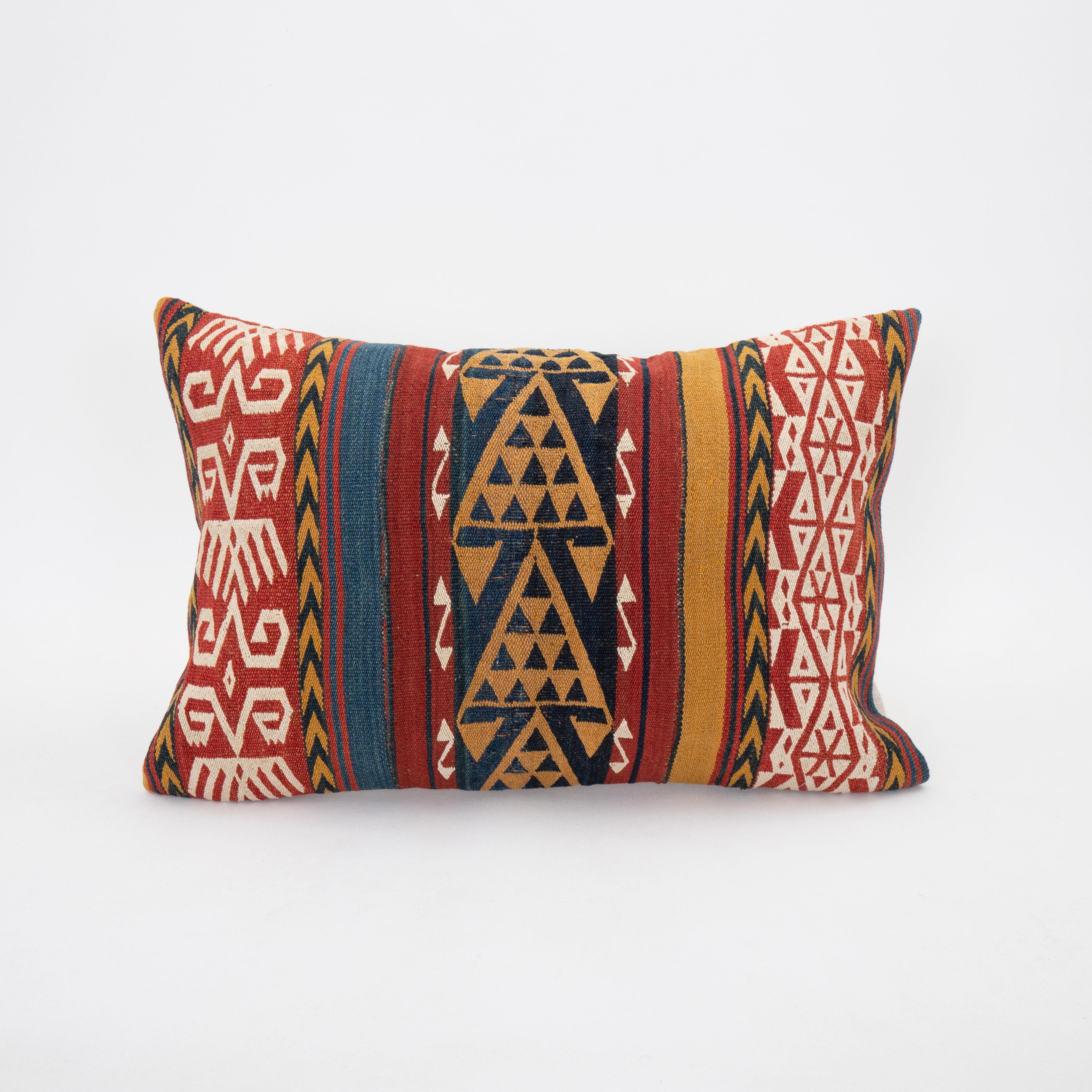 This pillowcase was made from a Central Asian , Uzbek Gudjeri ( jajim ) kilim, late 19th C.
It does not come with an insert. 
Zipper closure.
Der clean recommended.
