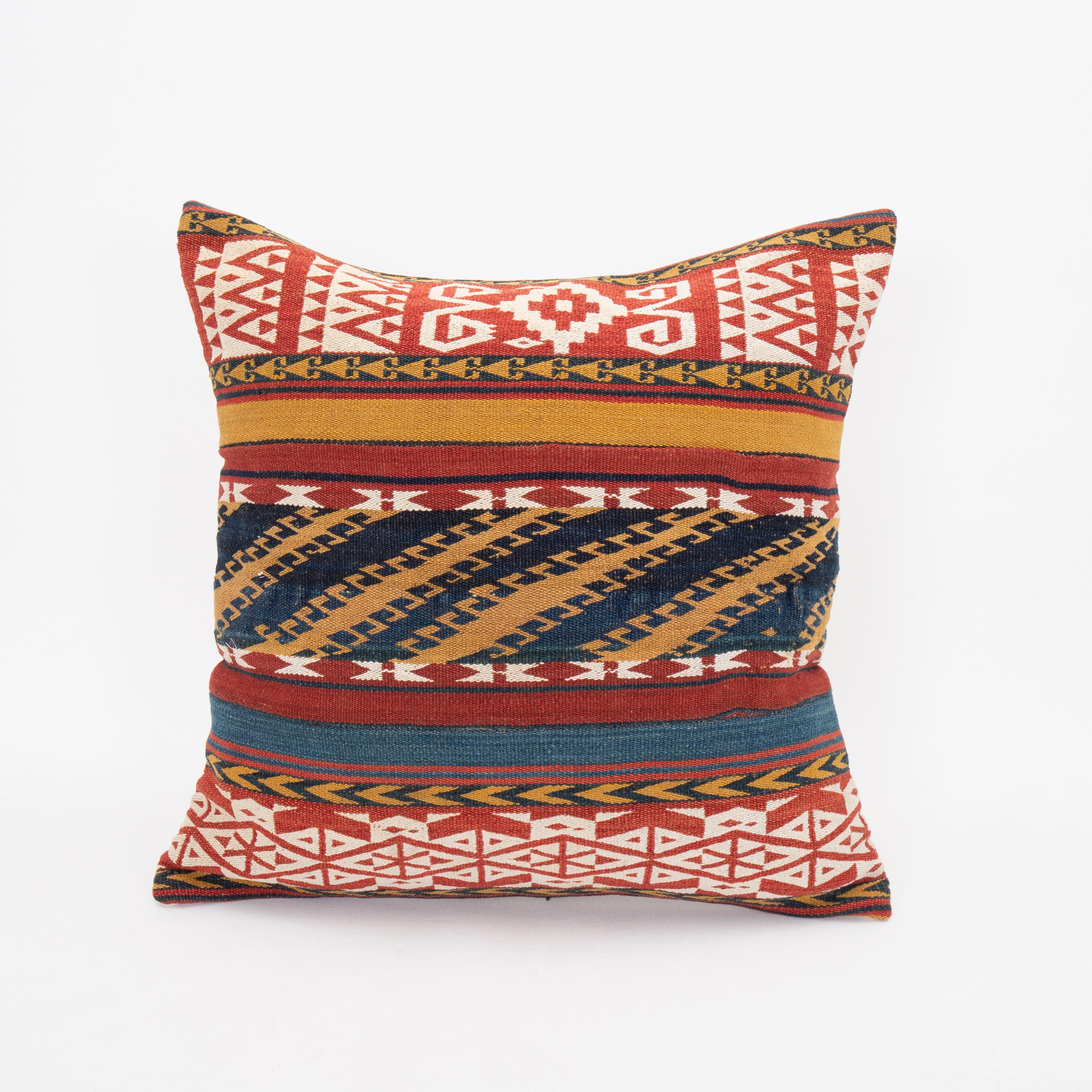 This pillowcase was made from a Central Asian , Uzbek Gudjeri ( jajim ) kilim, late 19th C.
It does not come with an insert. 
Zipper closure.
Der clean recommended.
