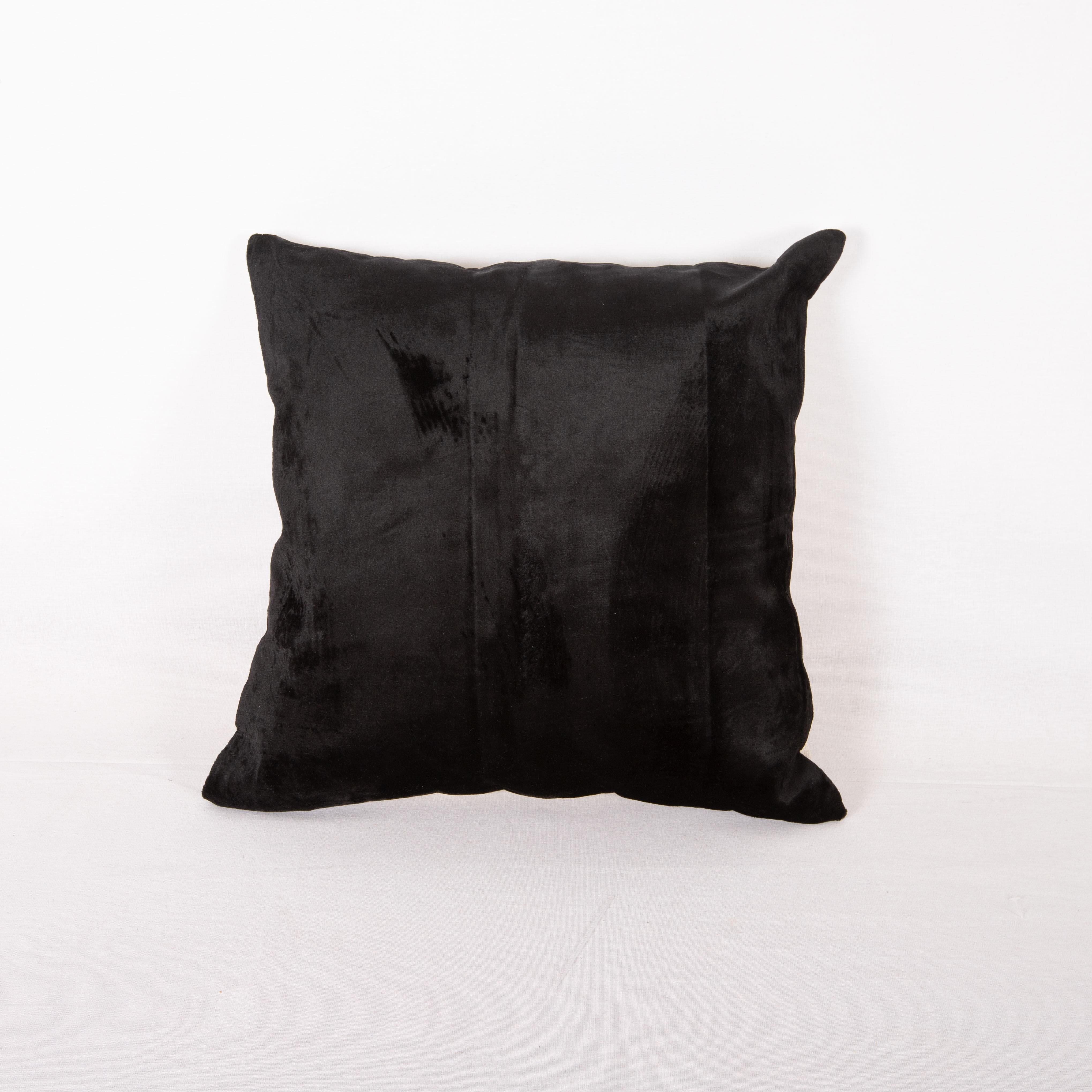 This pillow case is made from a Mid 20th C. Silk velvet, usually used for caftans/ chapans and quilts.

It does not come with an insert, but a bag made to size to accommodate insert materials.
Linen in the back.
Zipper closure.
Dry cleaning is