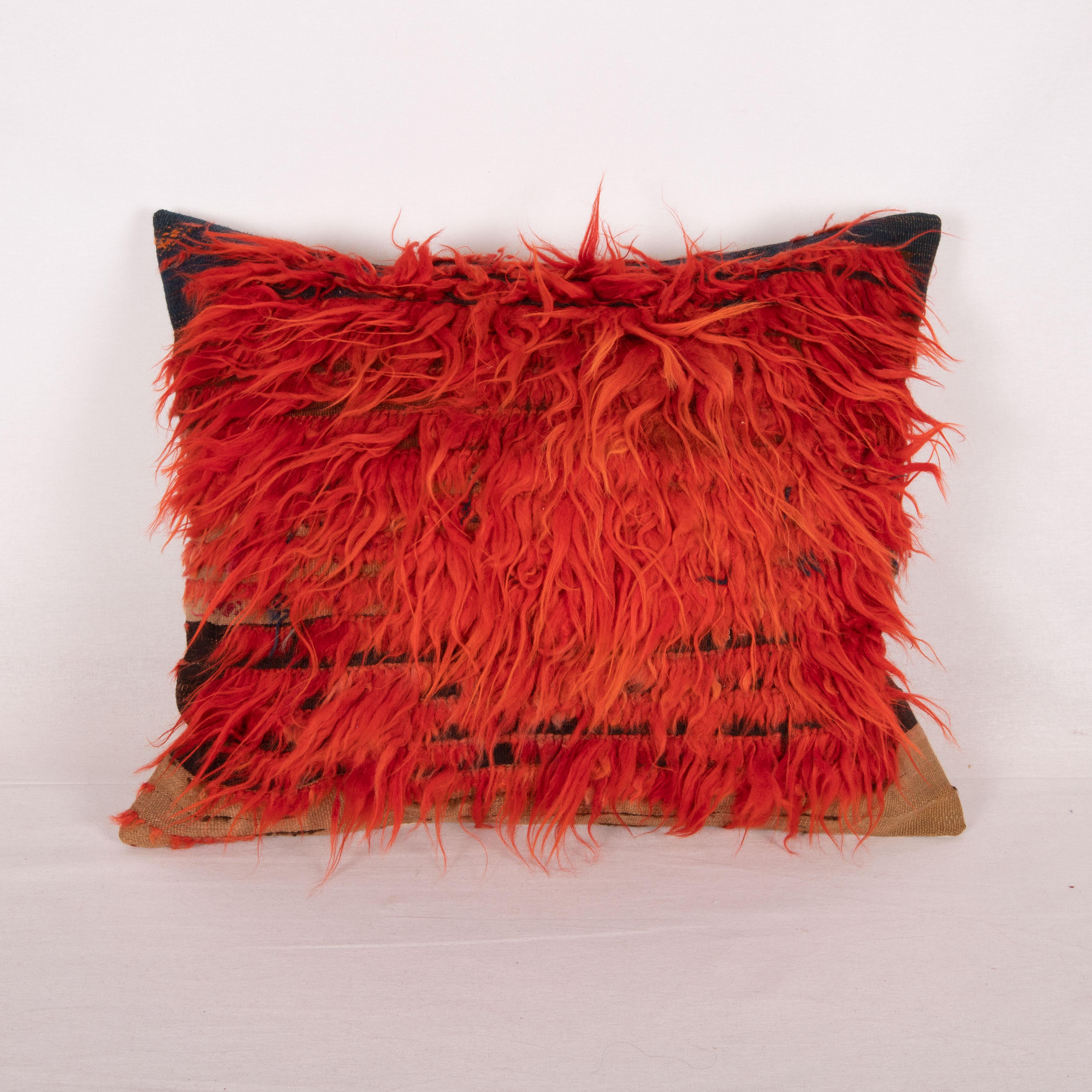 This pillow is made from a wild fragment from an Eastern Anatolian Tulu bedding rug.
It does not come with an insert but a bag made to size to accommodate insert materials.
Linen in the back.
Zipper closure
dry clean is recommended.
 
