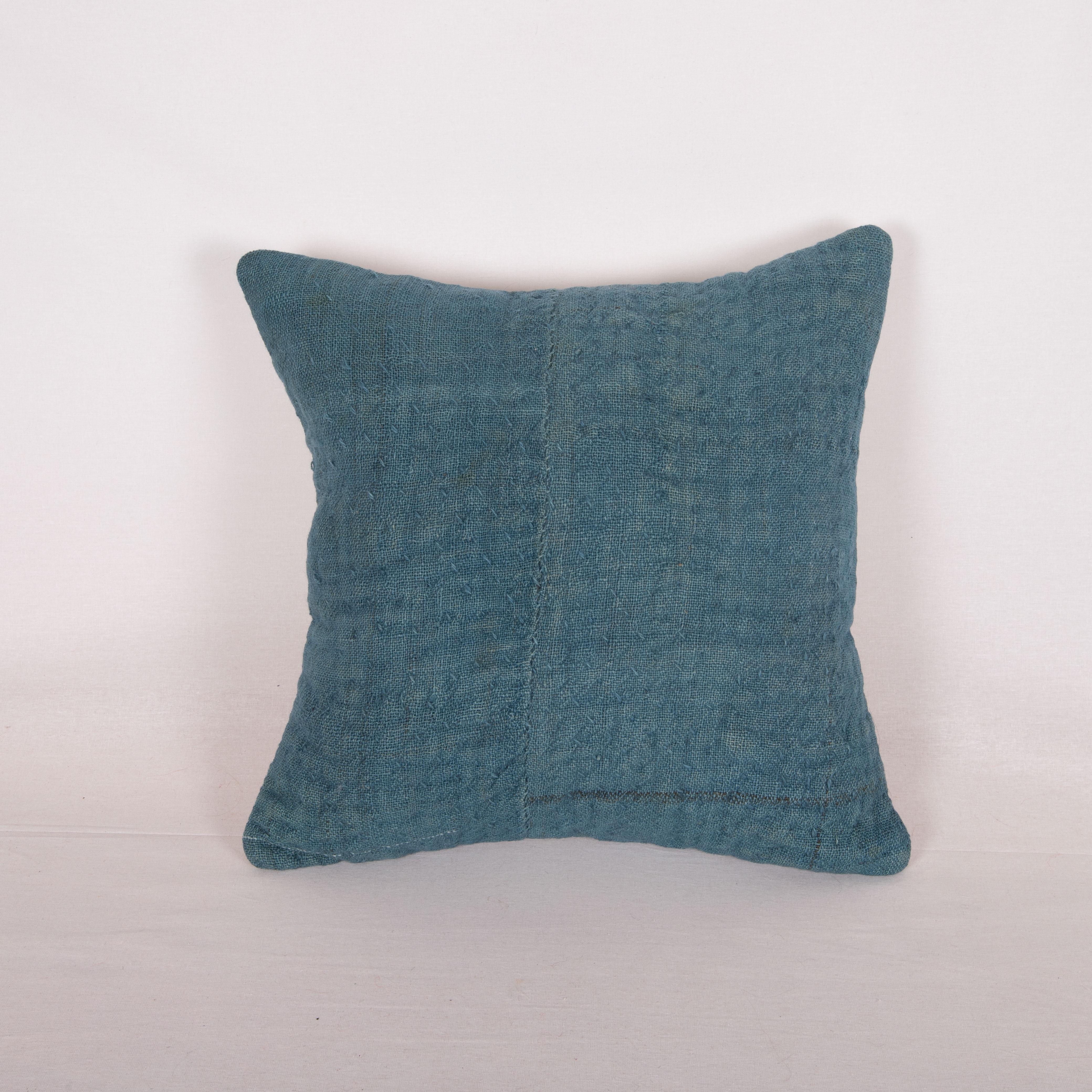 This pillow case made from a vintage Anatolian wool quilt, Turkey.
The sitiching on it is hand done and in silk.
It does not come with an insert.
Linen in the back.
Zipper closure.
Dry clean is reccommended.
 