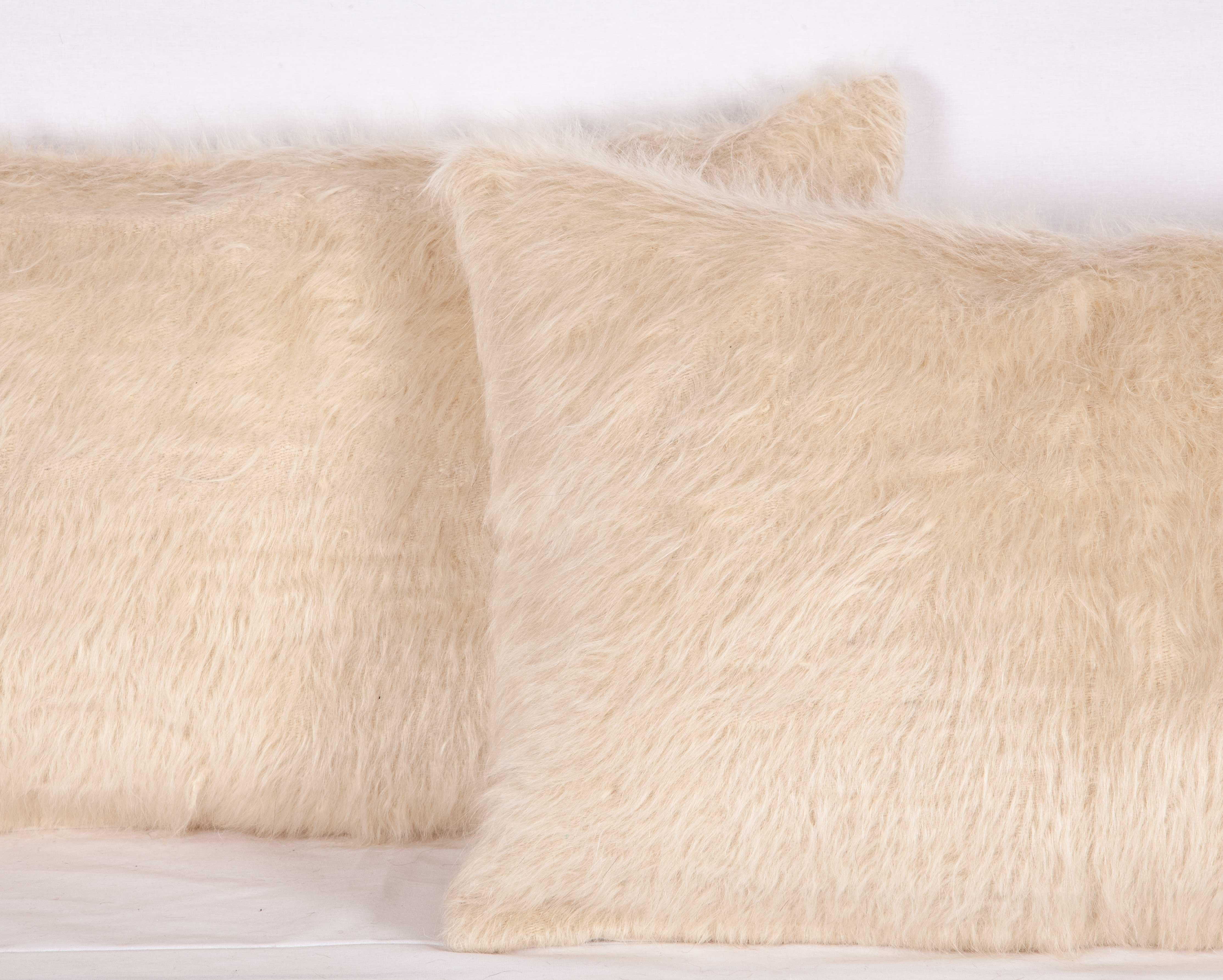 The pillows are made out of mid-20th century. Anatolian angora siirt blanket. They do not come with an insert but they come with bags made to the size and from of cotton fabric to accommodate the filling. Backing is cotton canvas. Please note