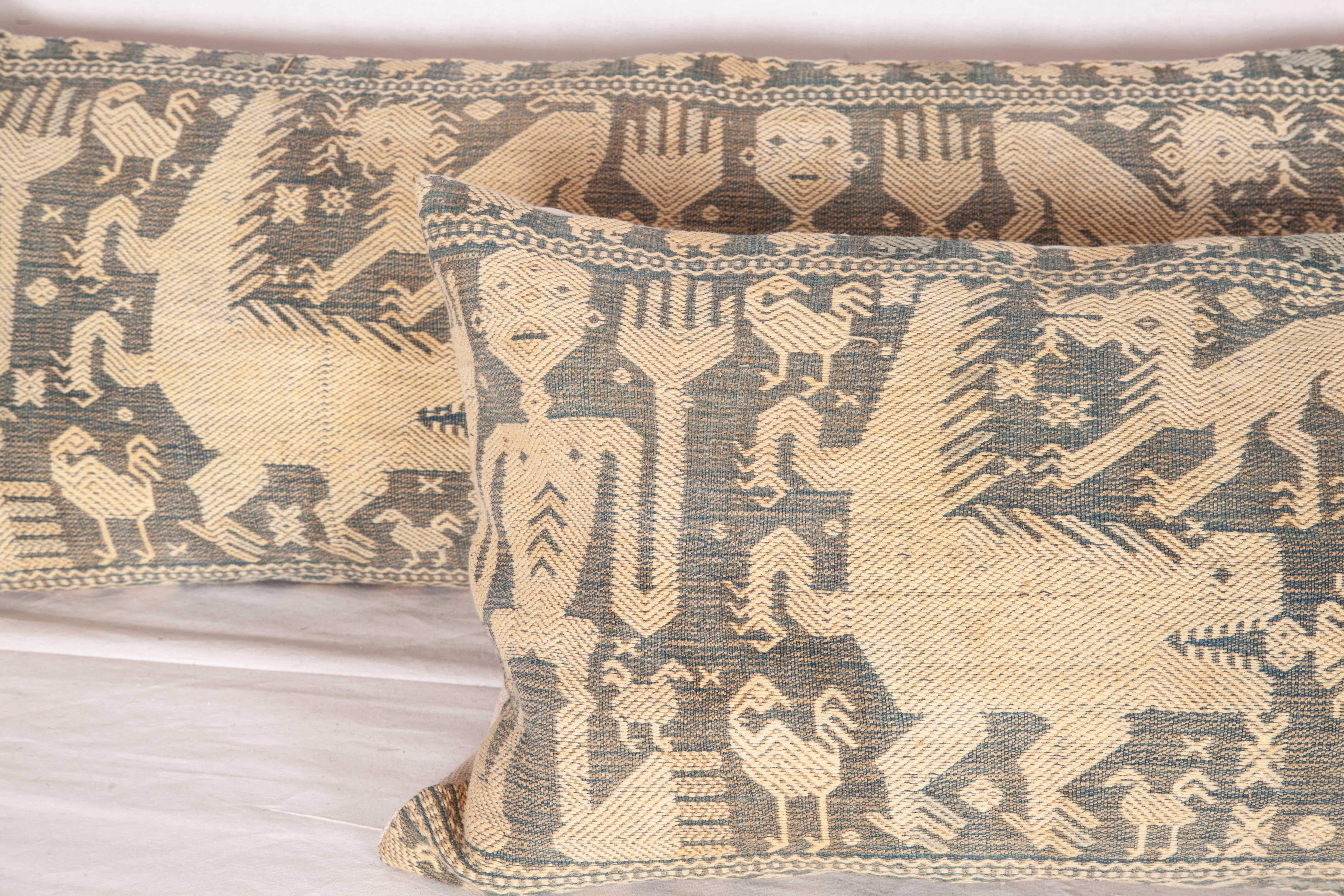 Suzani Pillow Cases Fashioned from a Warp Faced Indonesian Textile