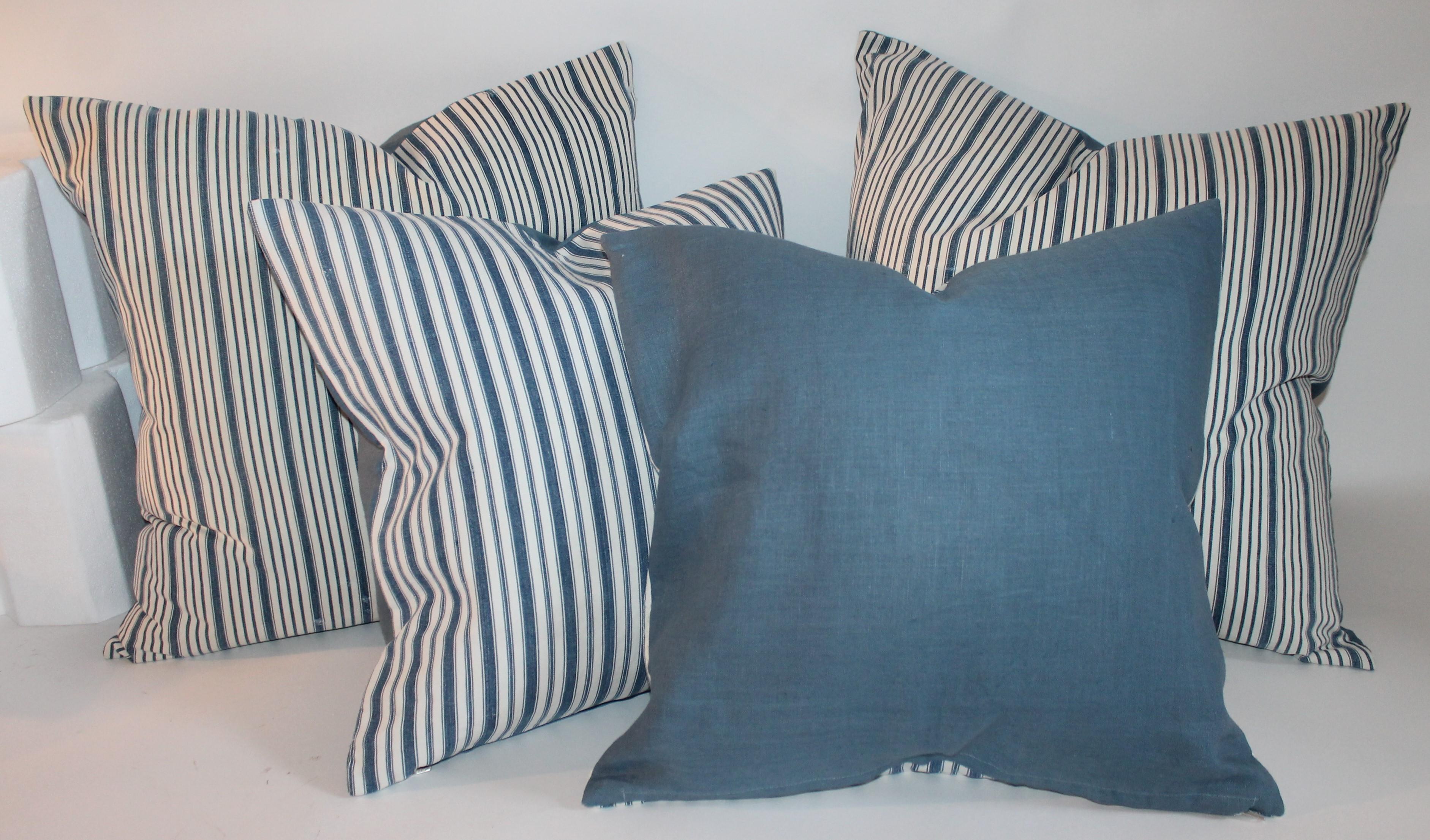 These two pairs of 19th century blue and white ticking pillows are in good condition. The backings are in cotton linen.
Large pair of pillows - 22 x 22
Smaller pair of pillows -20 x 20.